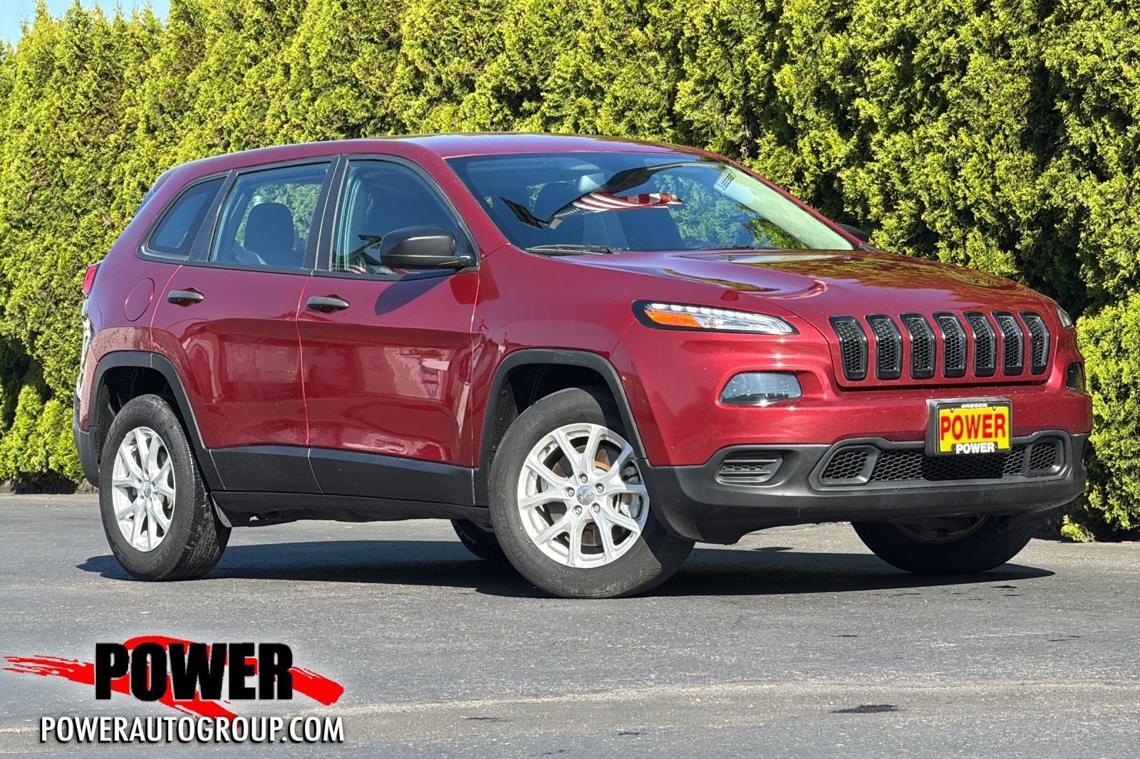 2017 Jeep Cherokee Sport in Maroon — front three-quarter view
