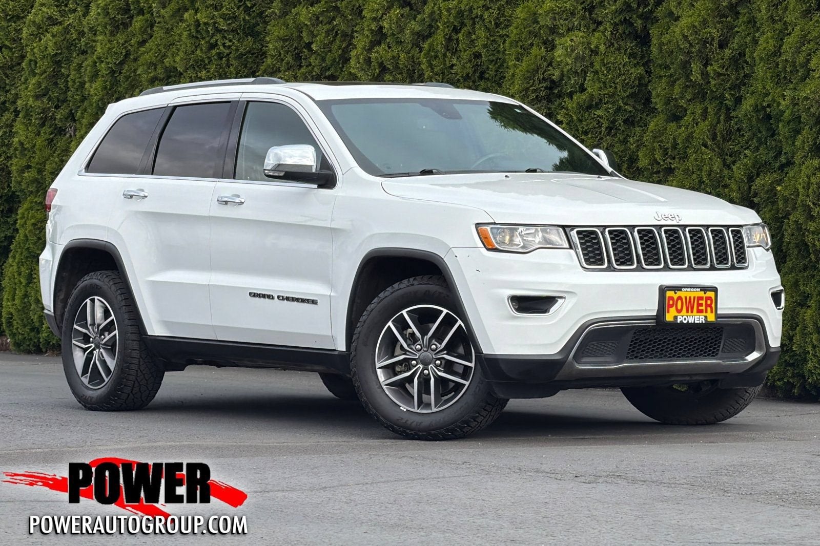 2020 Jeep Grand Cherokee Limited in White — front three-quarter view