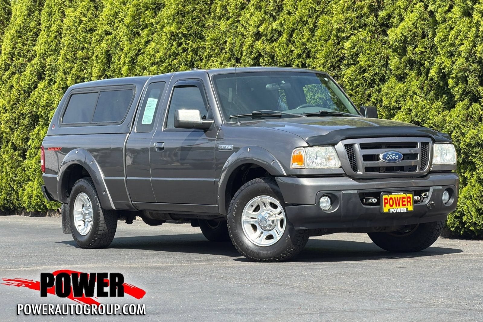 2011 Ford Ranger XLT in Dark Shadow Gra — front three-quarter view