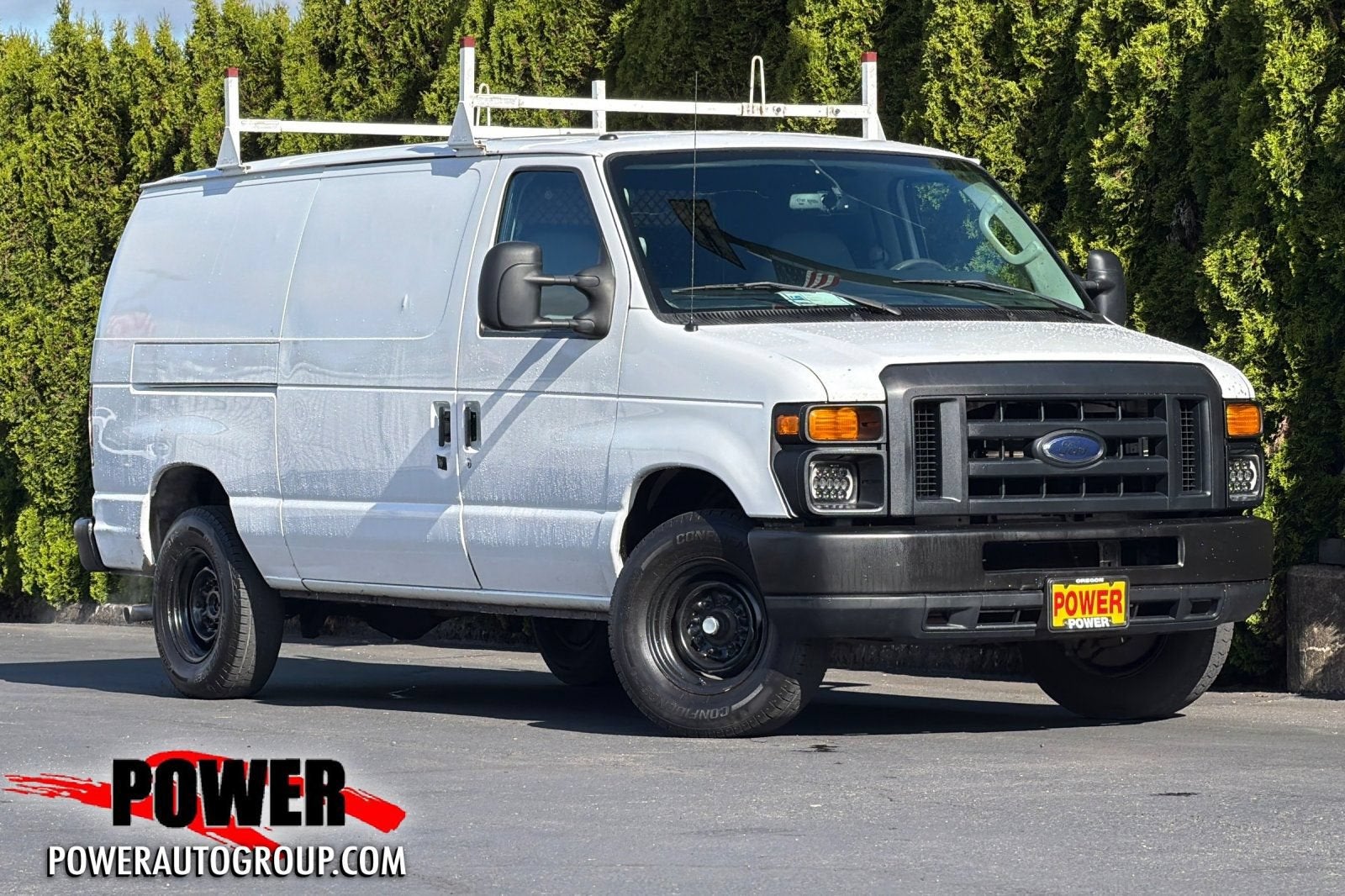 2013 Ford Econoline Cargo Van Commercial in White — front three-quarter view