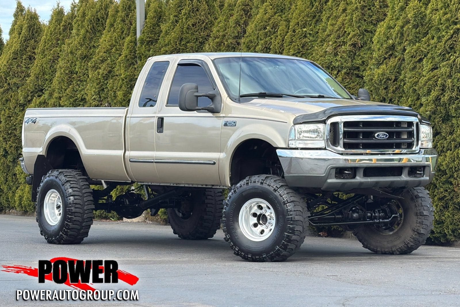 2000 Ford Super Duty F-250 XL in Tan — front three-quarter view