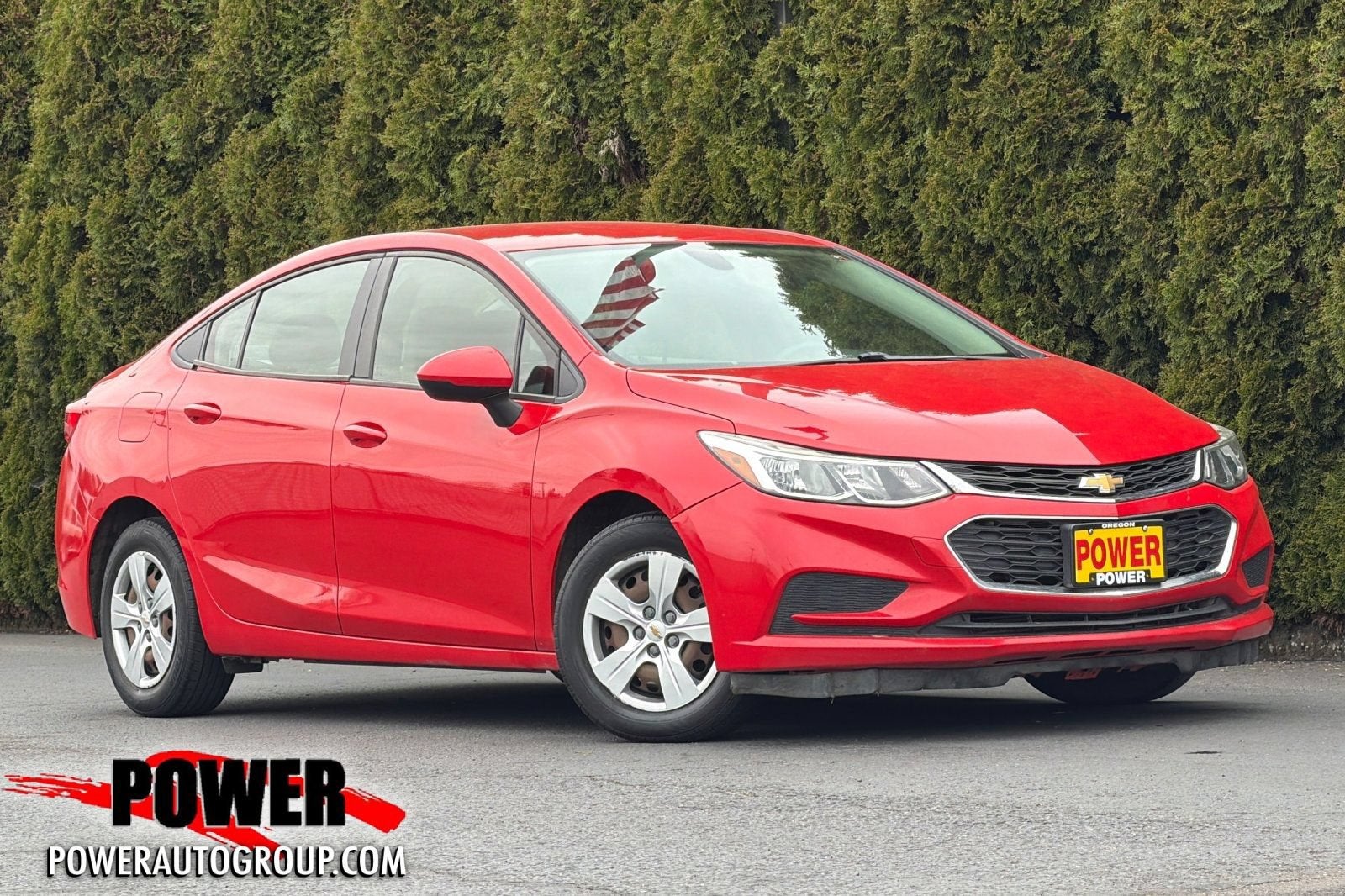 2017 Chevrolet Cruze LS in Red Hot — front three-quarter view