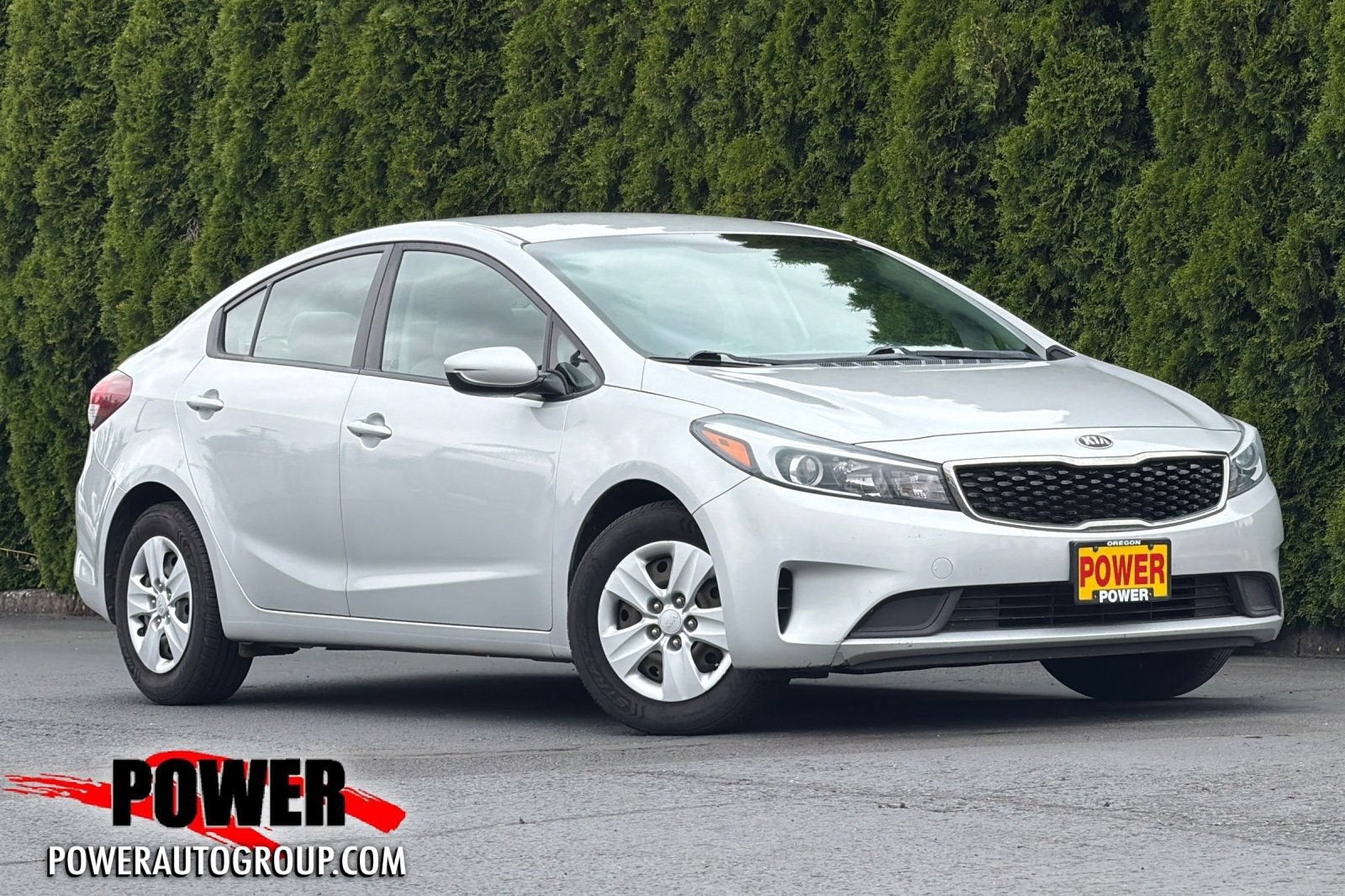 2017 Kia Forte LX in White — front three-quarter view