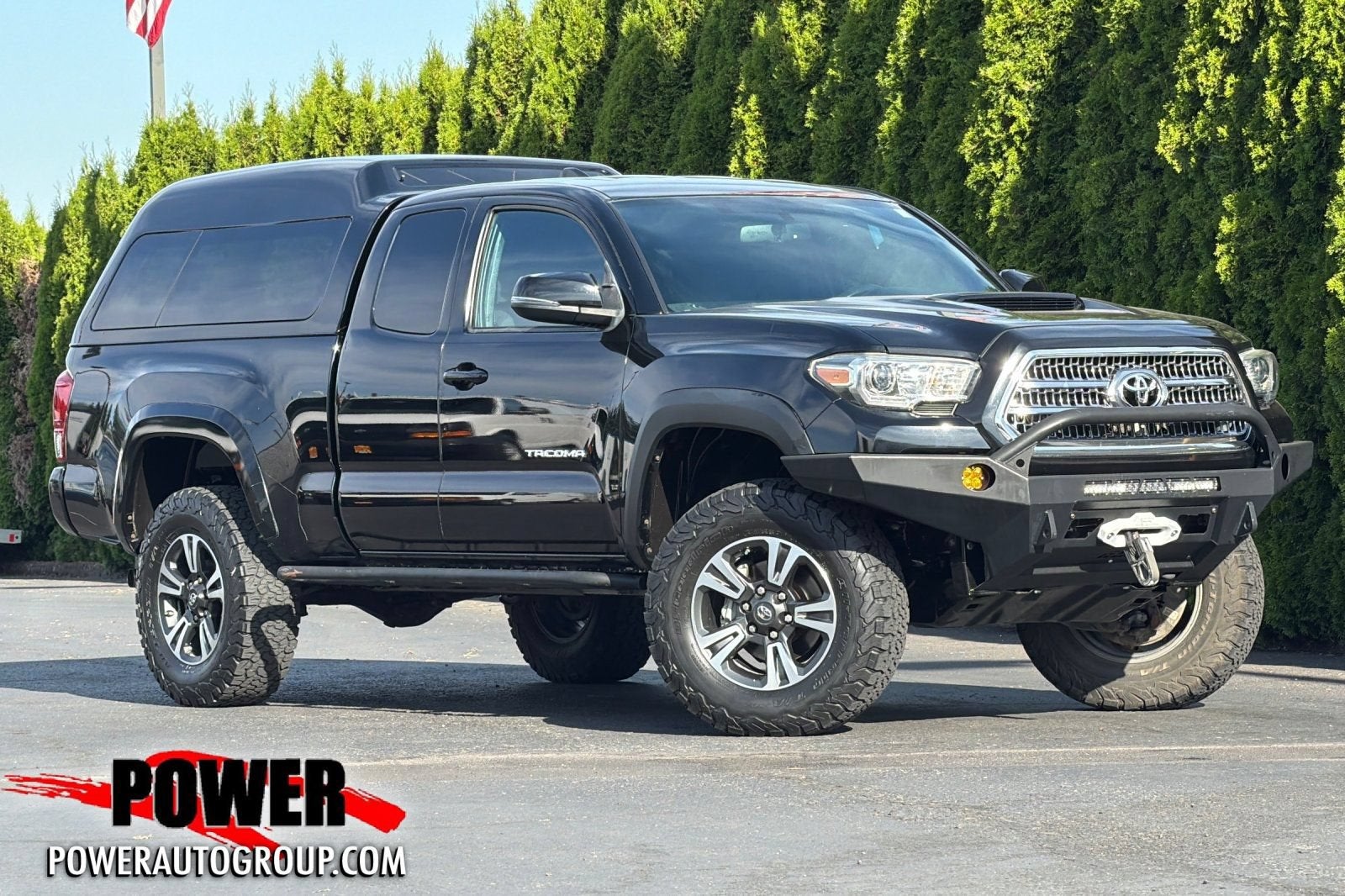 2016 Toyota Tacoma SR5 in Black — front three-quarter view