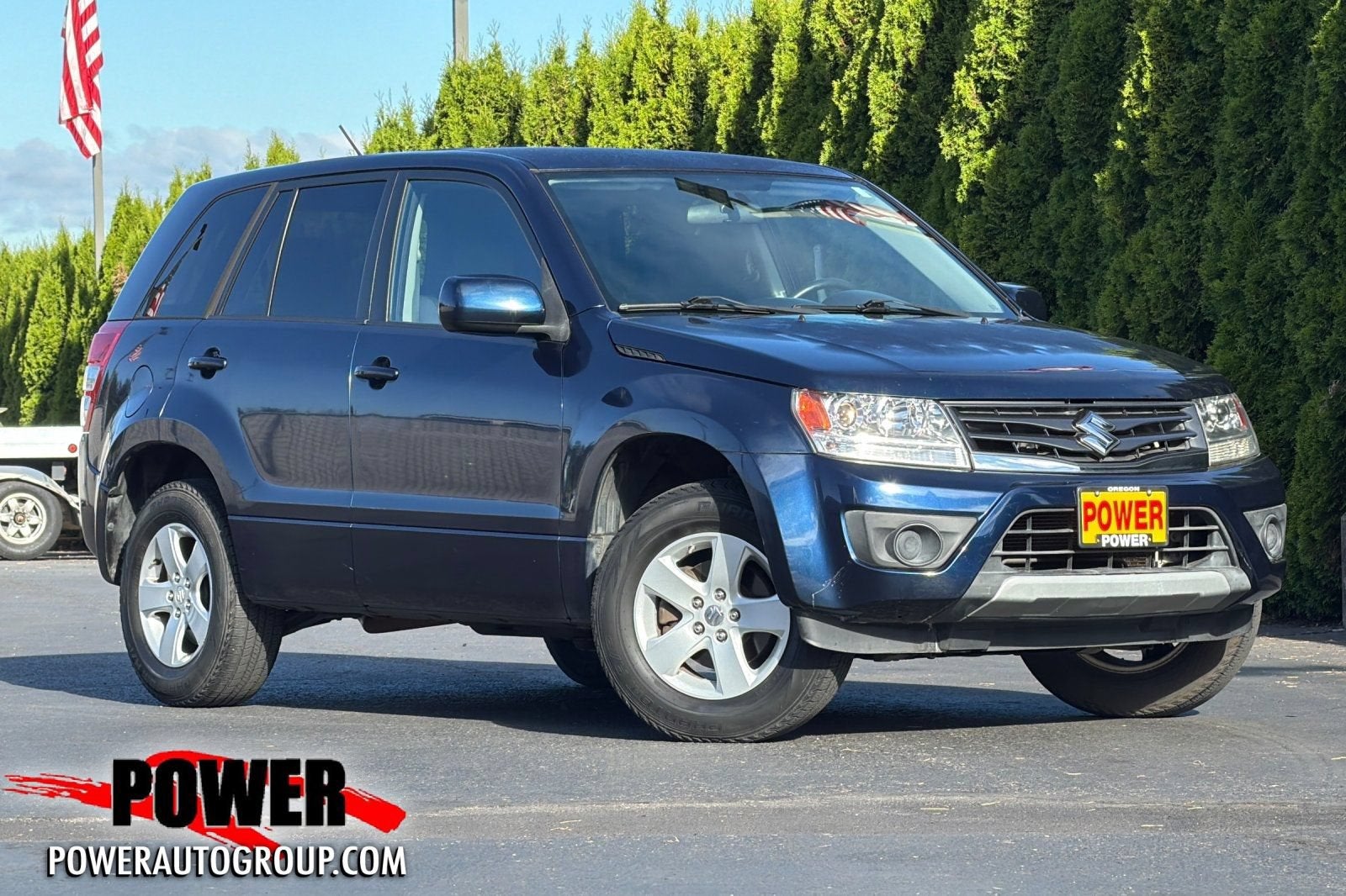 2013 Suzuki Grand Vitara Premium in Blue — front three-quarter view