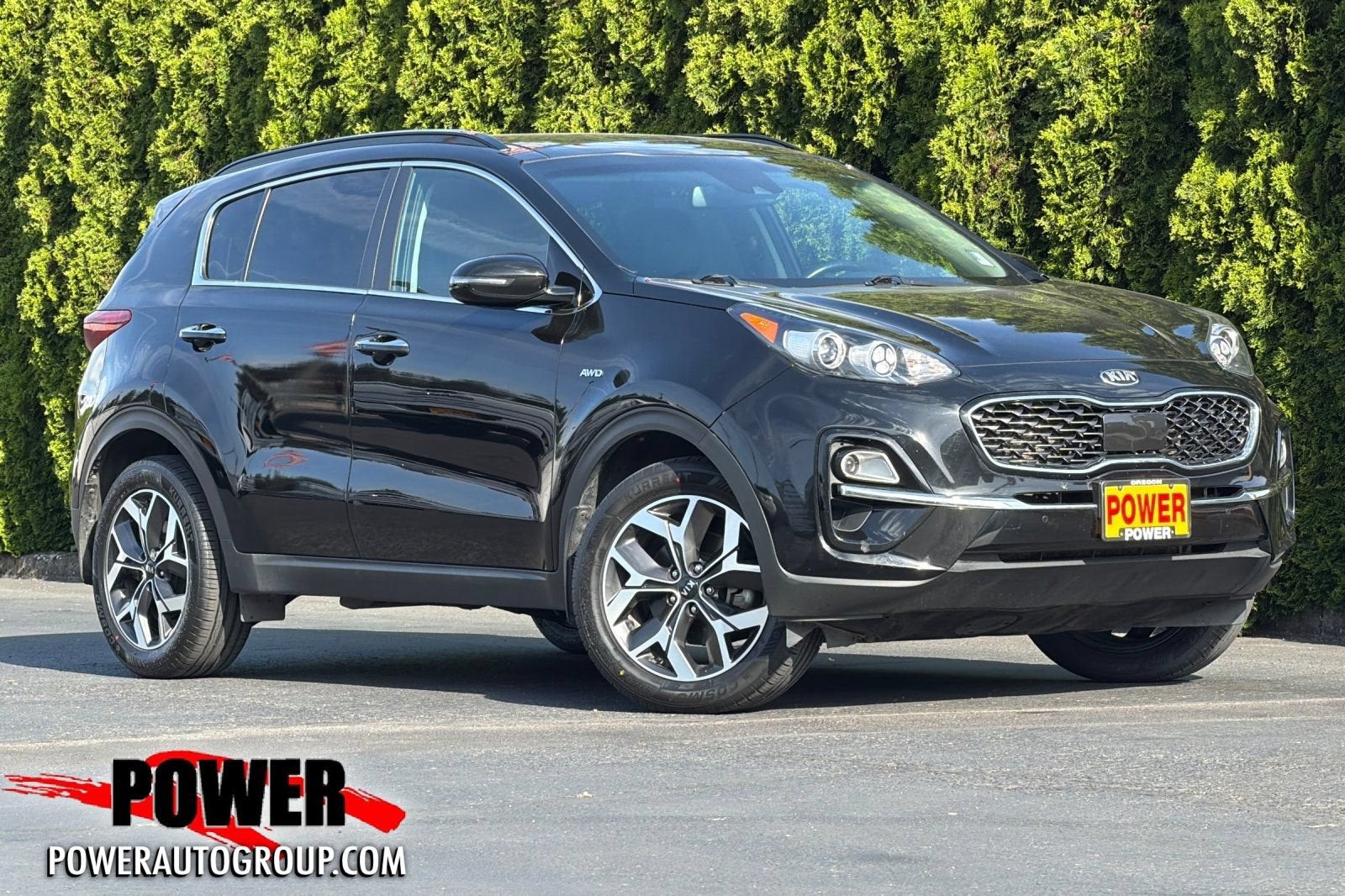 2021 Kia Sportage EX in Black — front three-quarter view