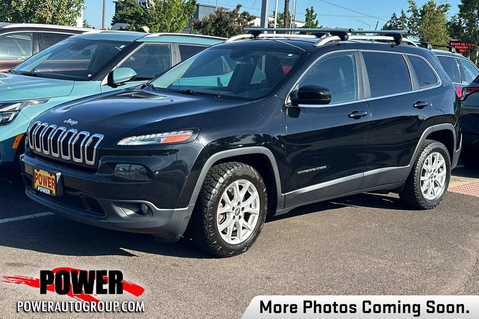2018 Jeep Cherokee Latitude Plus in Diamond Black Cry — front three-quarter view