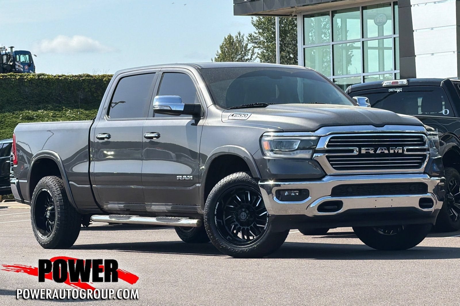 2020 RAM 1500 Laramie in Granite Crystal M — front three-quarter view