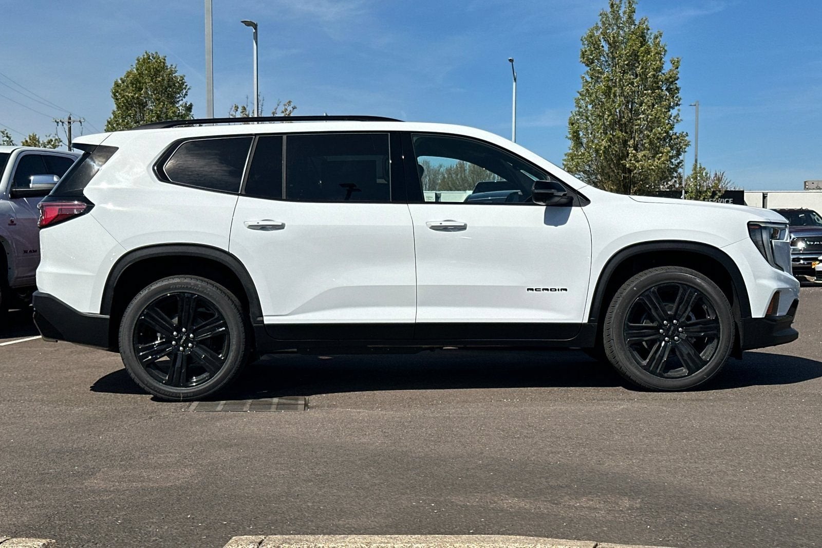 2026 GMC Acadia — rear three-quarter view