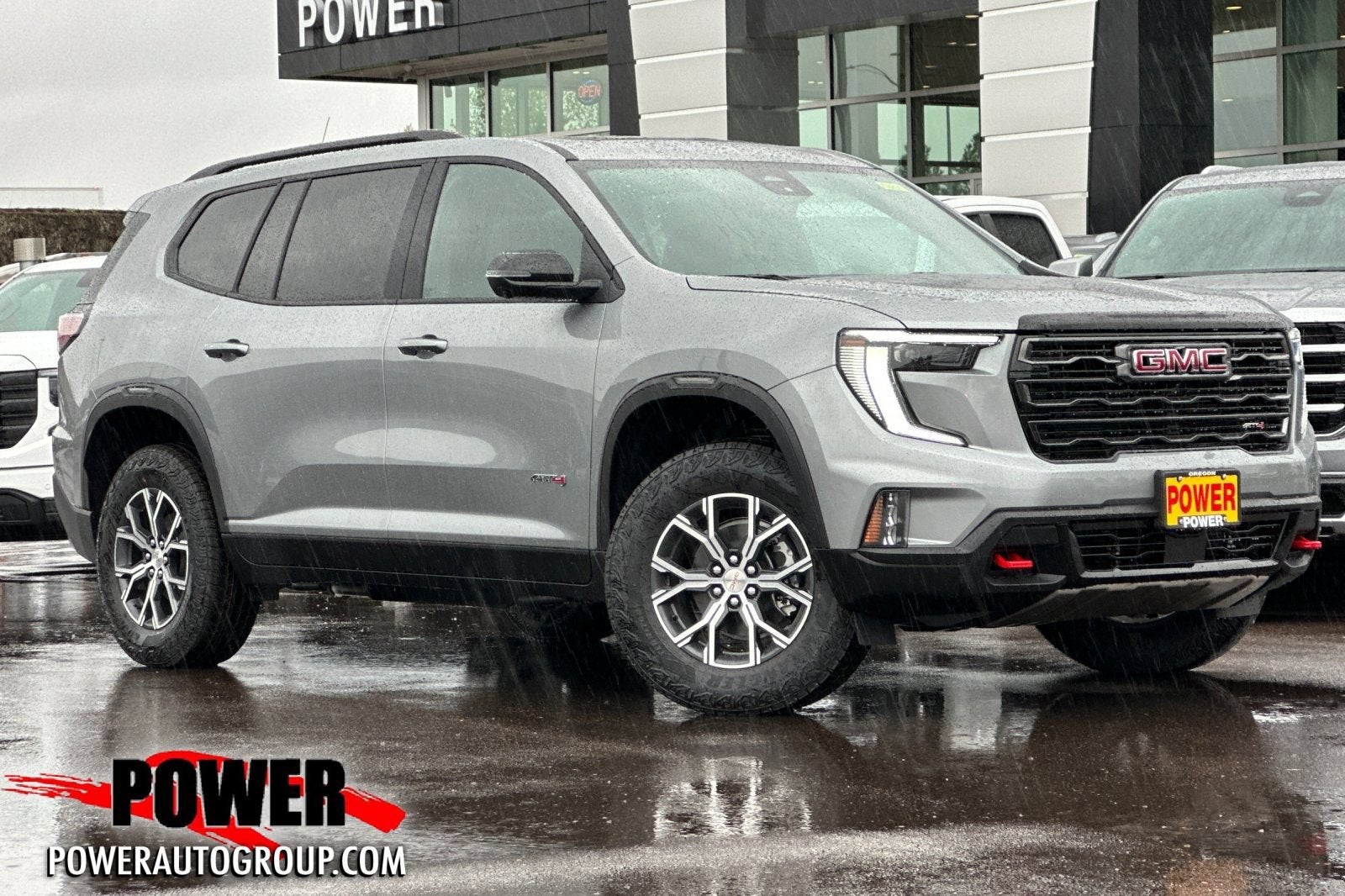 2026 GMC Acadia AT4 in Sterling Metallic — front three-quarter view