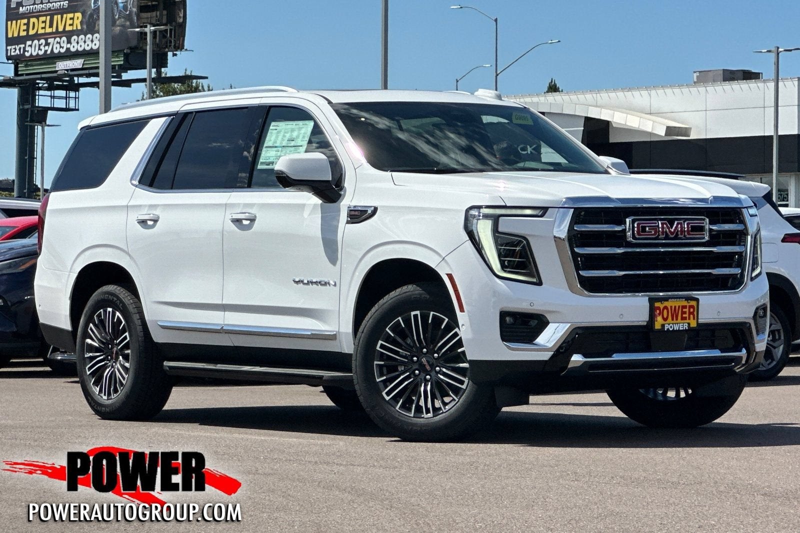 2026 GMC Yukon Elevation in Summit White — front three-quarter view
