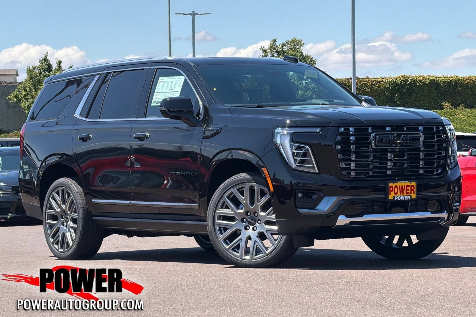 2026 GMC Yukon Denali Ultimate in Onyx Black — front three-quarter view