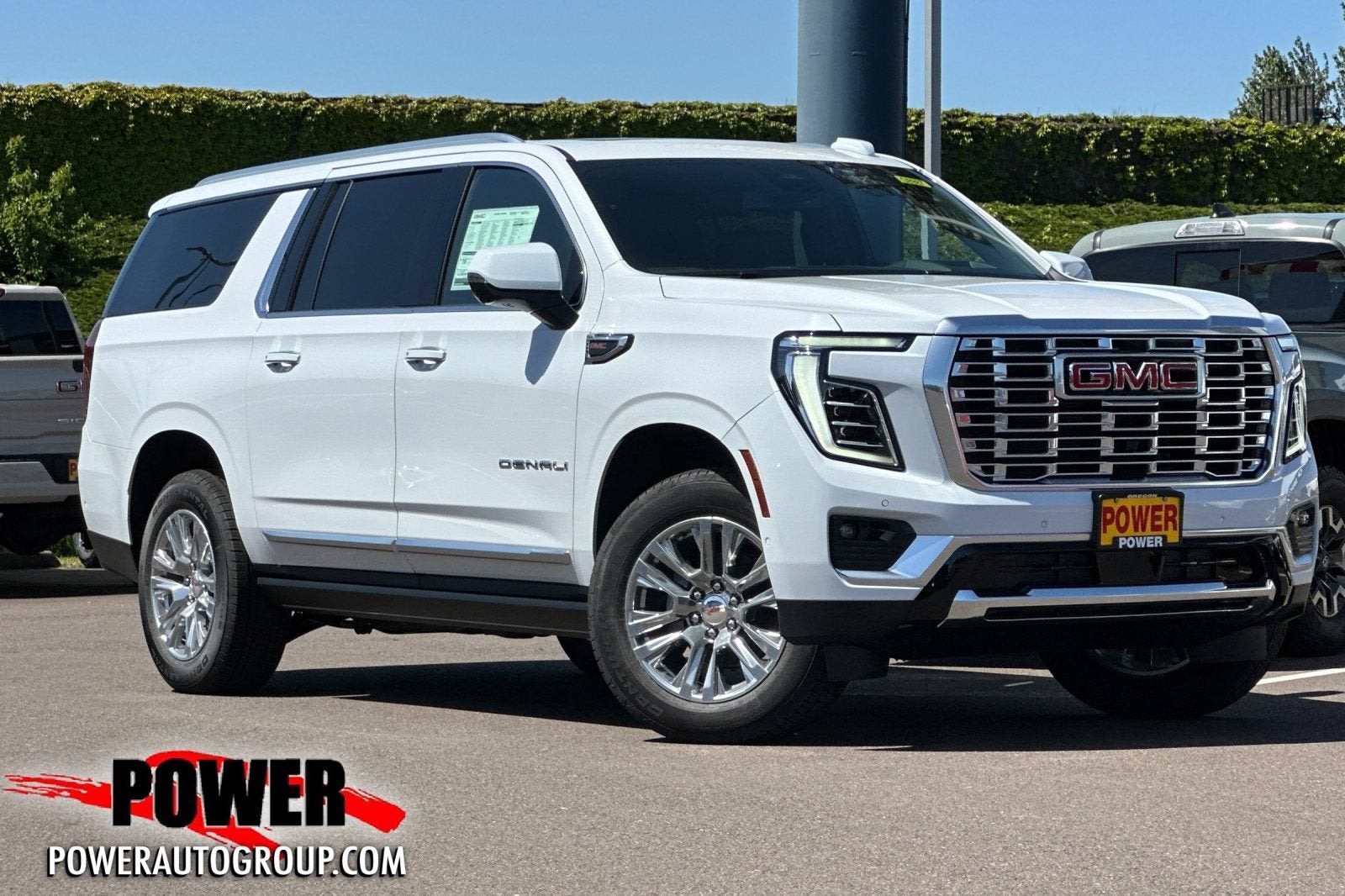 2026 GMC Yukon XL Denali in Glacier White Tricoat — front three-quarter view