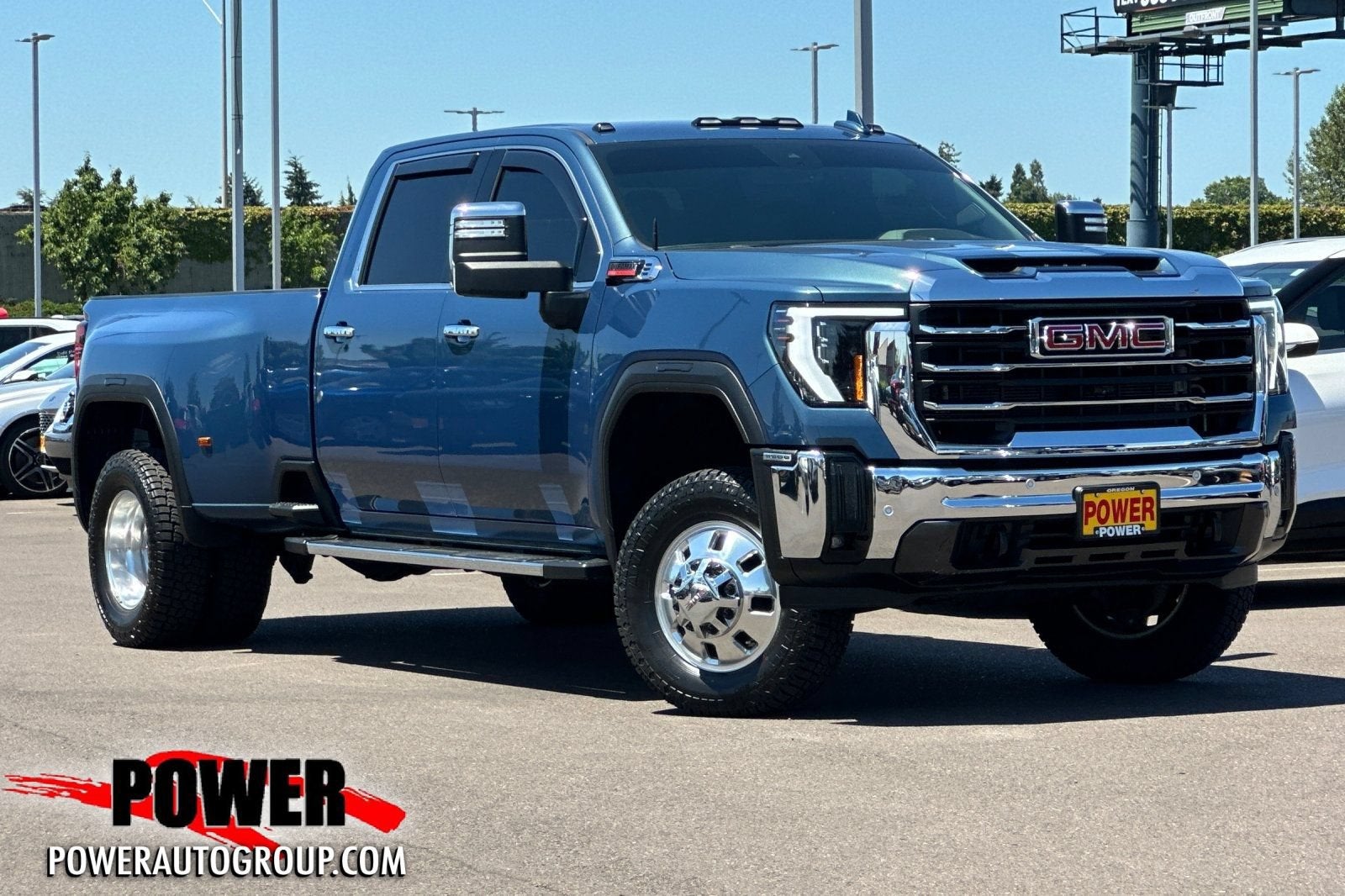 2024 GMC Sierra 3500 HD SLT DRW in Downpour Metallic — front three-quarter view