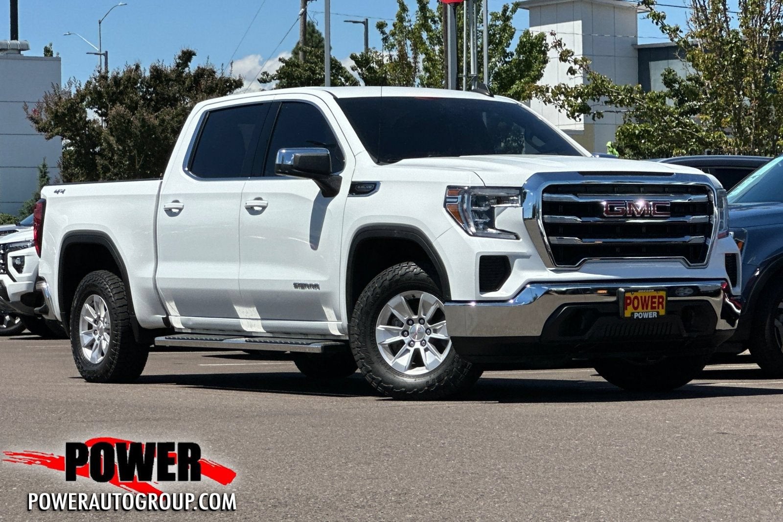 2019 GMC Sierra 1500 SLE in Summit White — front three-quarter view