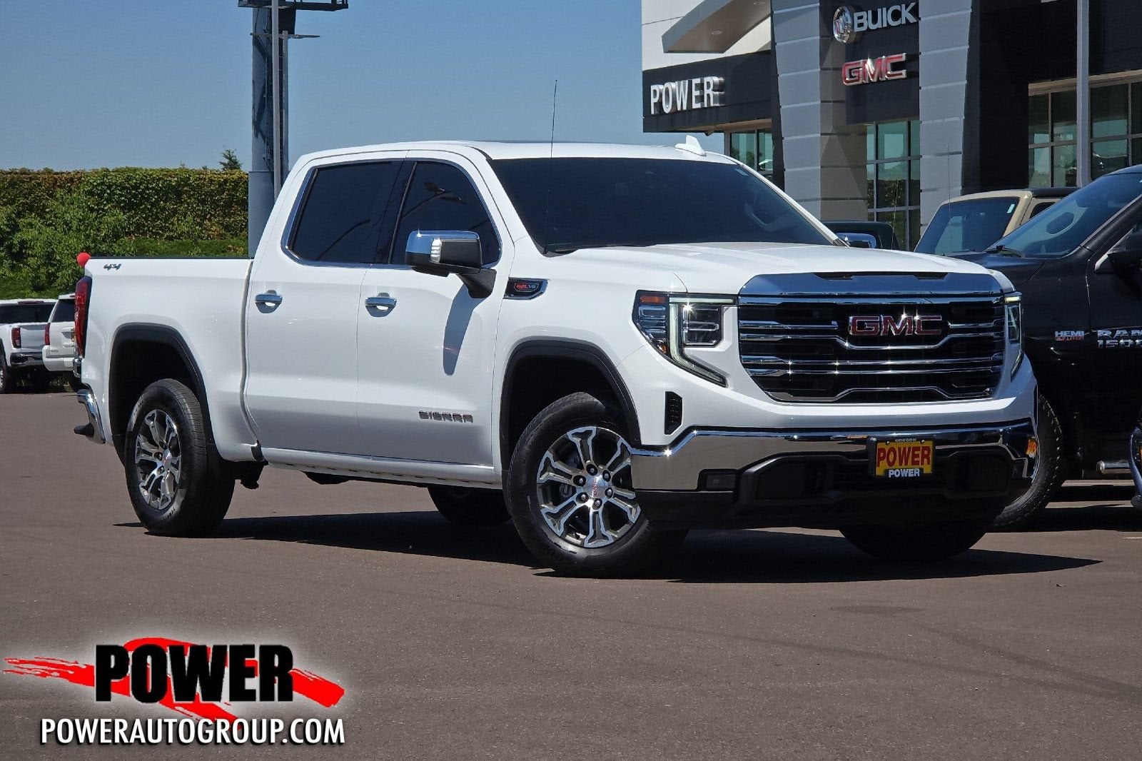 2022 GMC Sierra 1500 SLT in Summit White — front three-quarter view