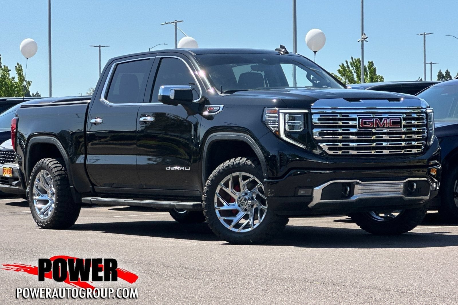 2022 GMC Sierra 1500 Denali in Onyx Black — front three-quarter view