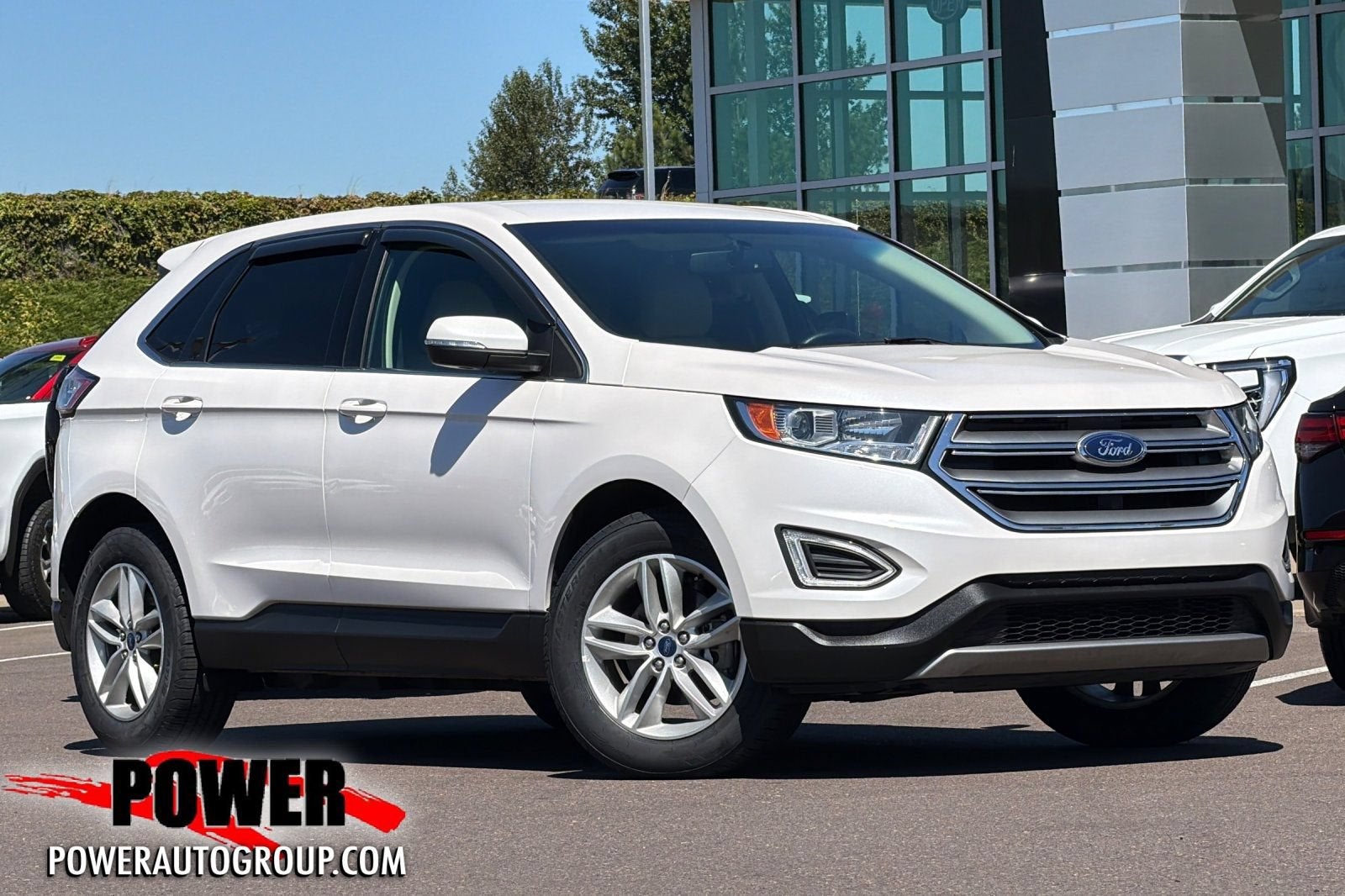 2018 Ford Edge SEL in White — front three-quarter view