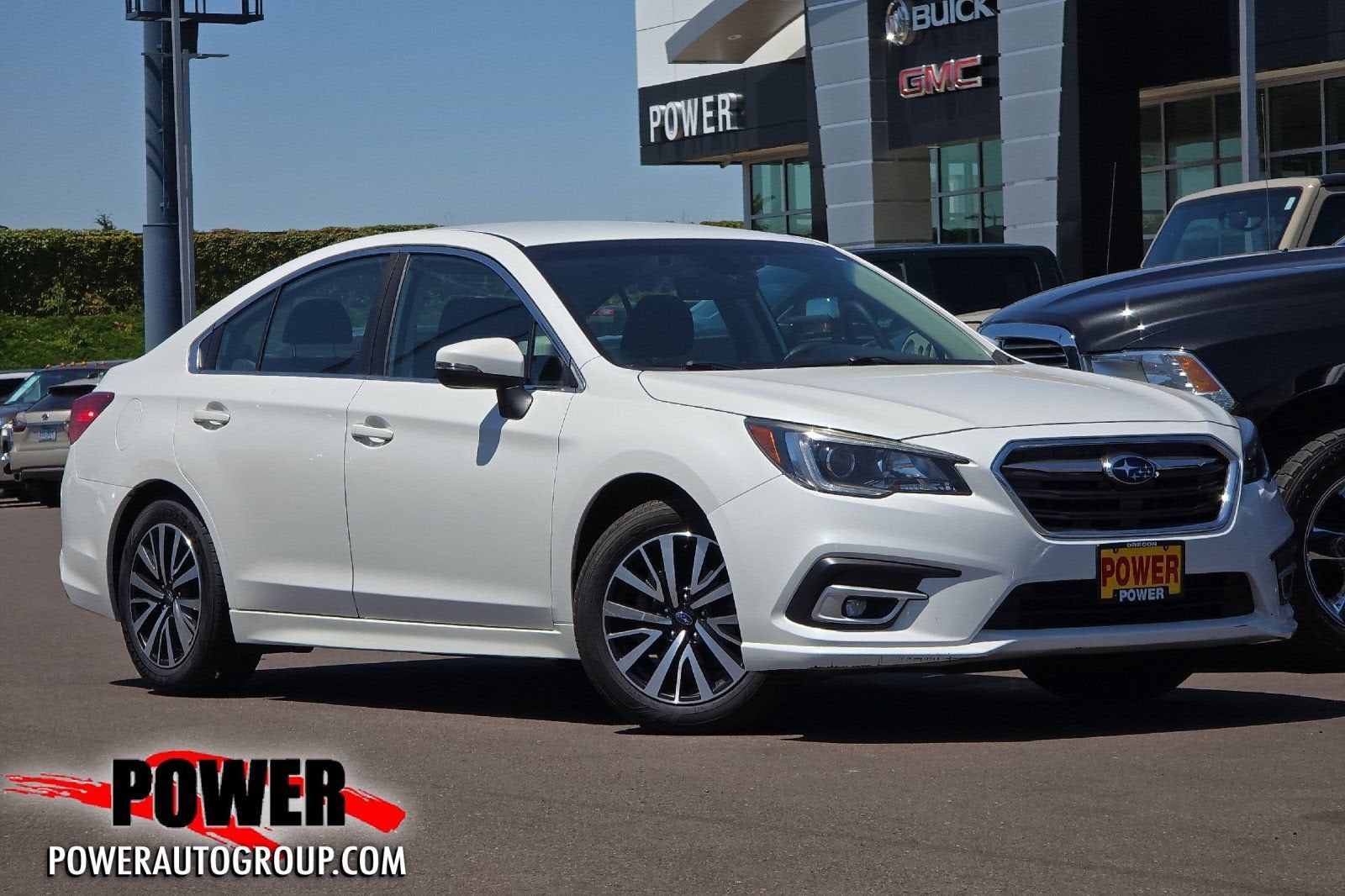 2019 Subaru Legacy Premium in Crystal White Pea — front three-quarter view