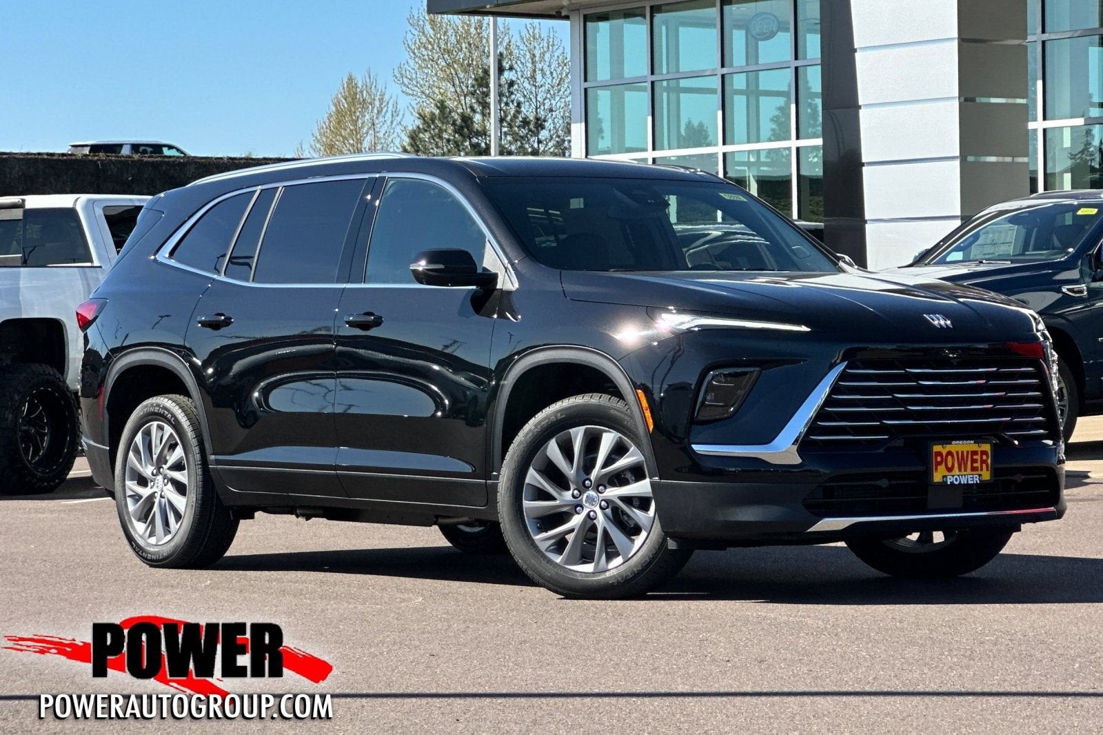 2026 Buick Enclave Preferred in Ebony Twilight Metallic — front three-quarter view