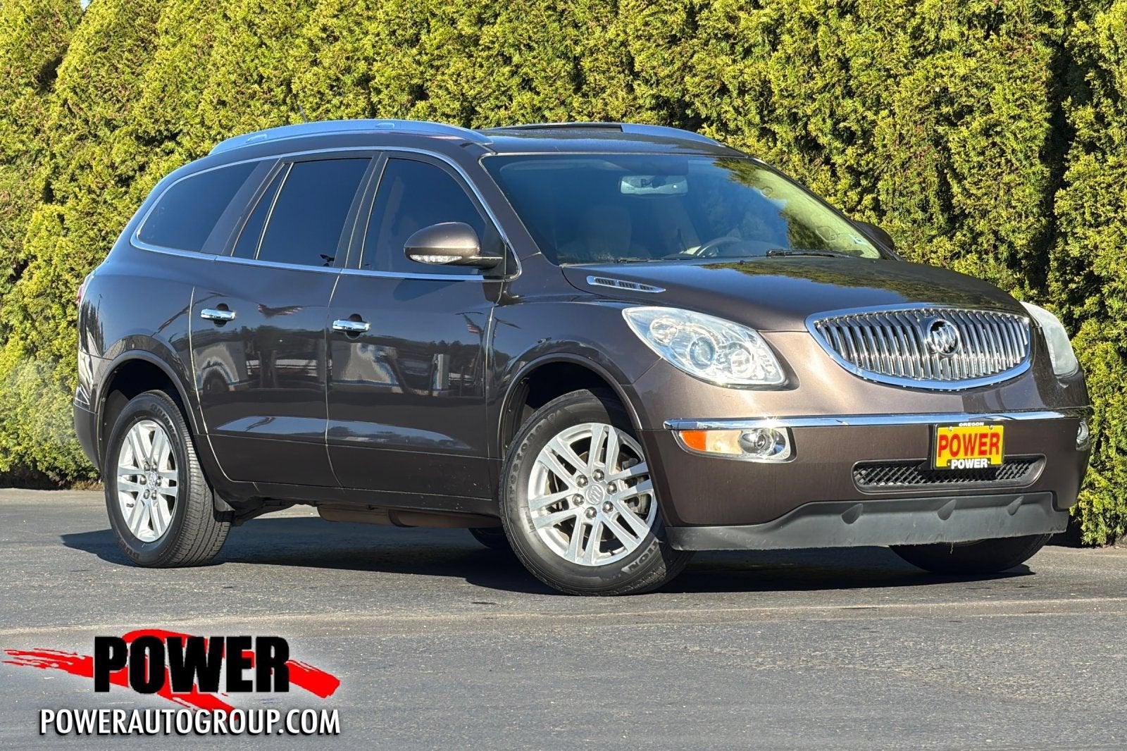 2012 Buick Enclave Convenience in Cocoa Metallic — front three-quarter view