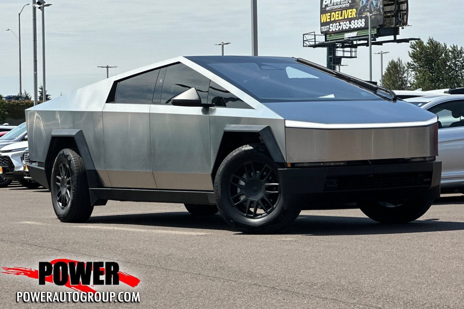 2025 Tesla Cybertruck 4DR AWD in Silver — front three-quarter view