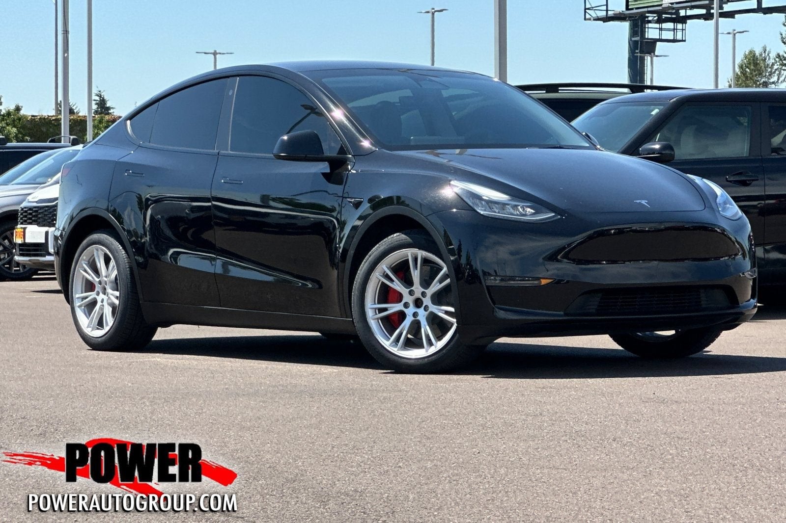 2023 Tesla Model Y Long Range in Other — front three-quarter view