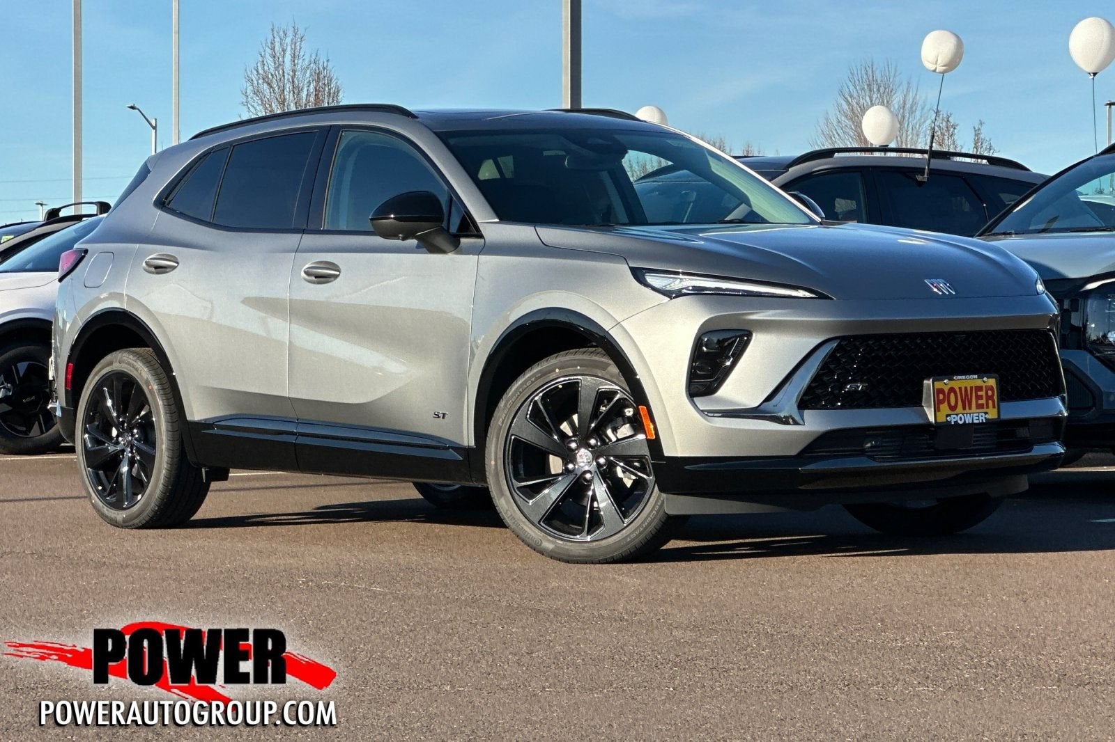 2026 Buick Envision Sport Touring in Moonstone Gray Metallic — front three-quarter view