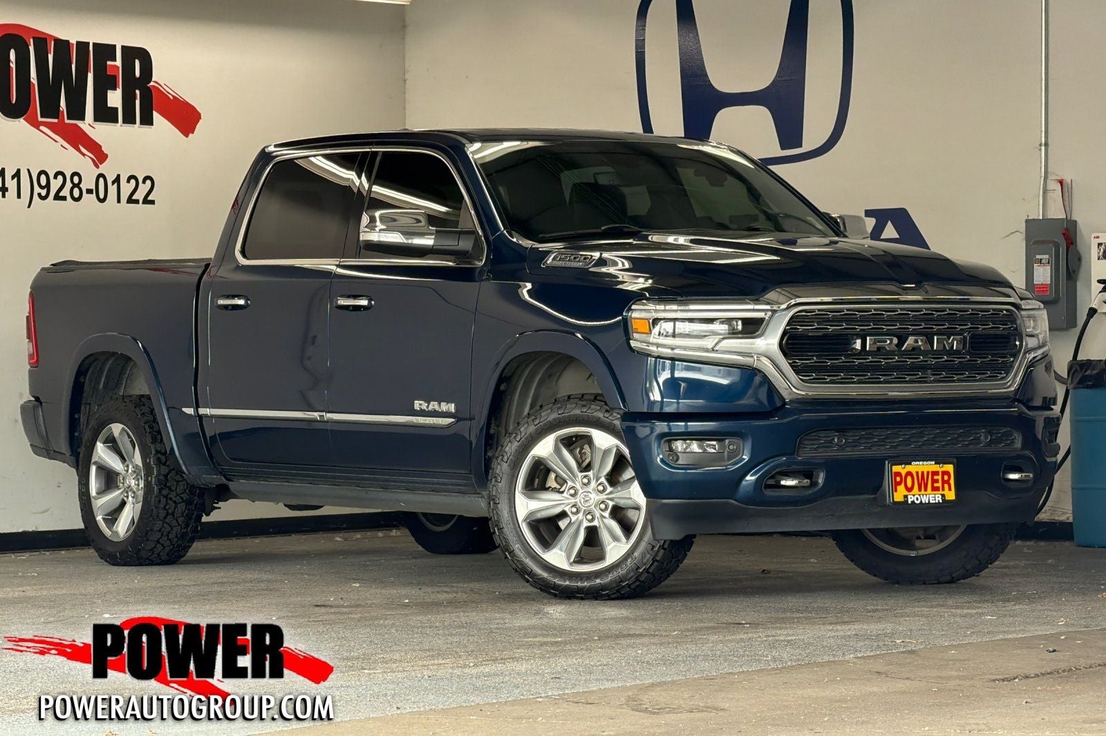 2022 RAM 1500 Limited in Patriot Blue Pearlcoat — front three-quarter view