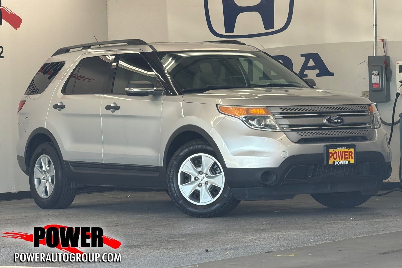 2014 Ford Explorer Base in Ingot Silver — front three-quarter view