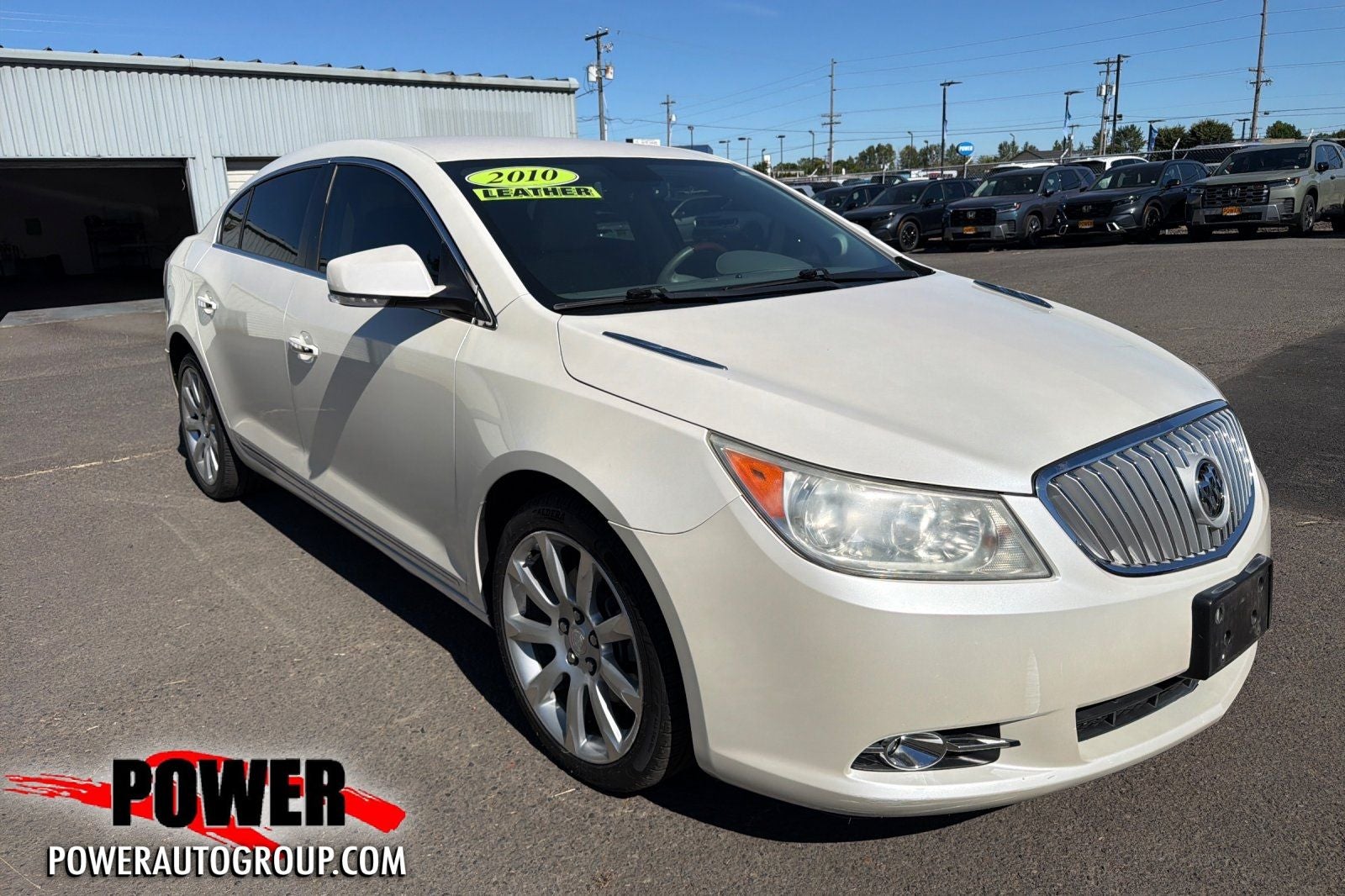 2010 Buick LaCrosse CXS in White Diamond Clearcoat — front three-quarter view