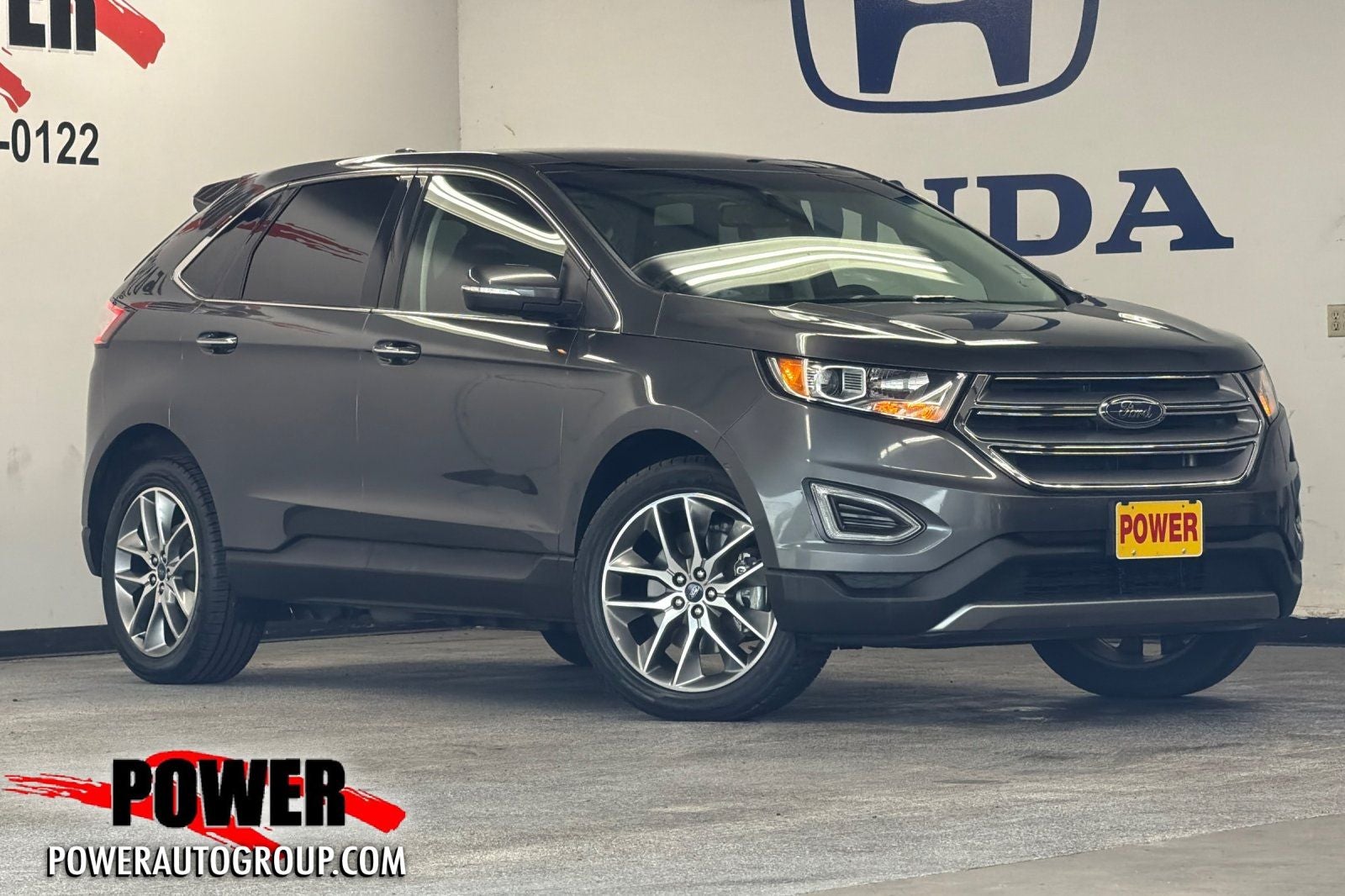 2017 Ford Edge Titanium in Magnetic — front three-quarter view