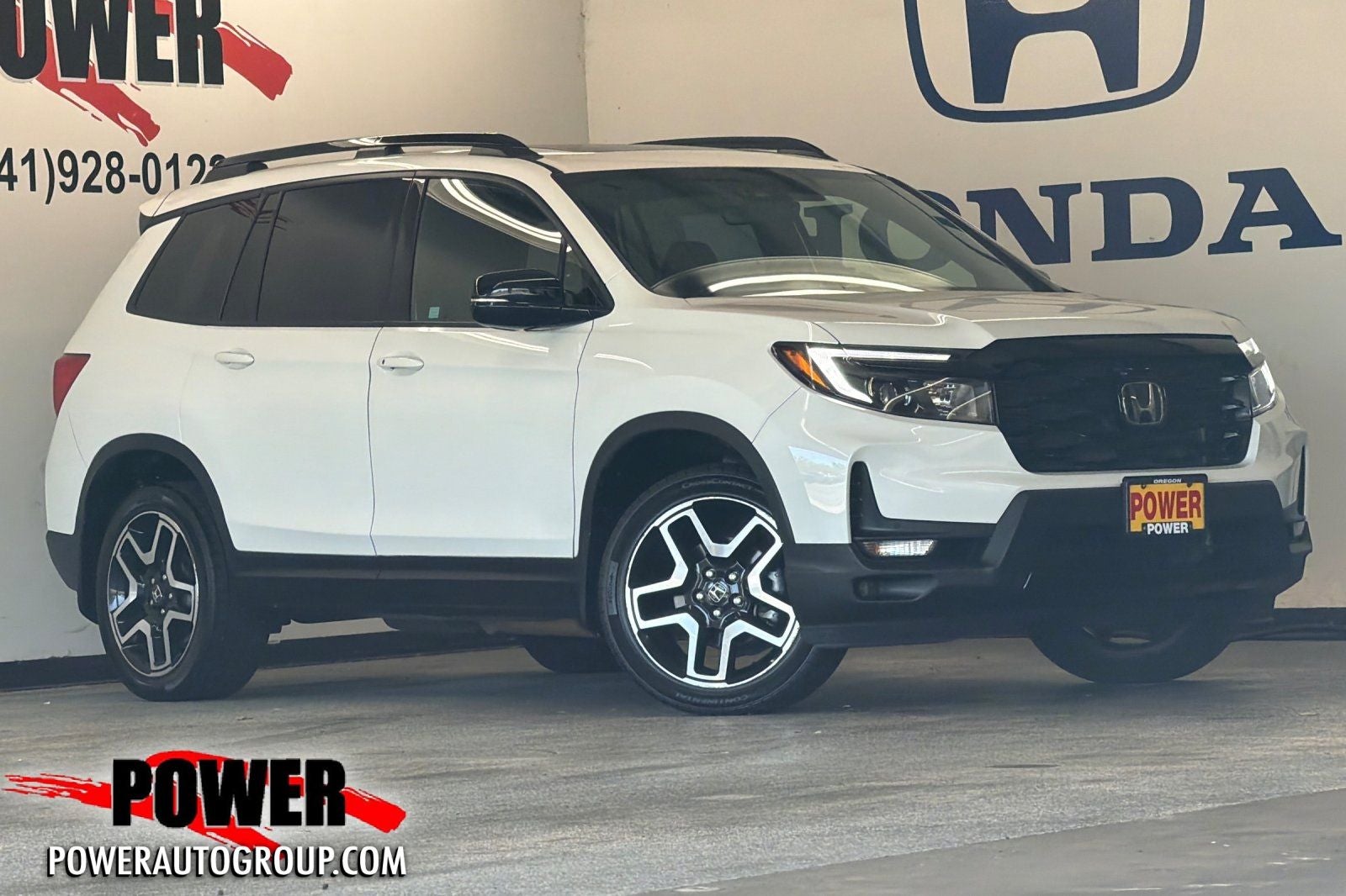 2022 Honda Passport Elite in White — front three-quarter view