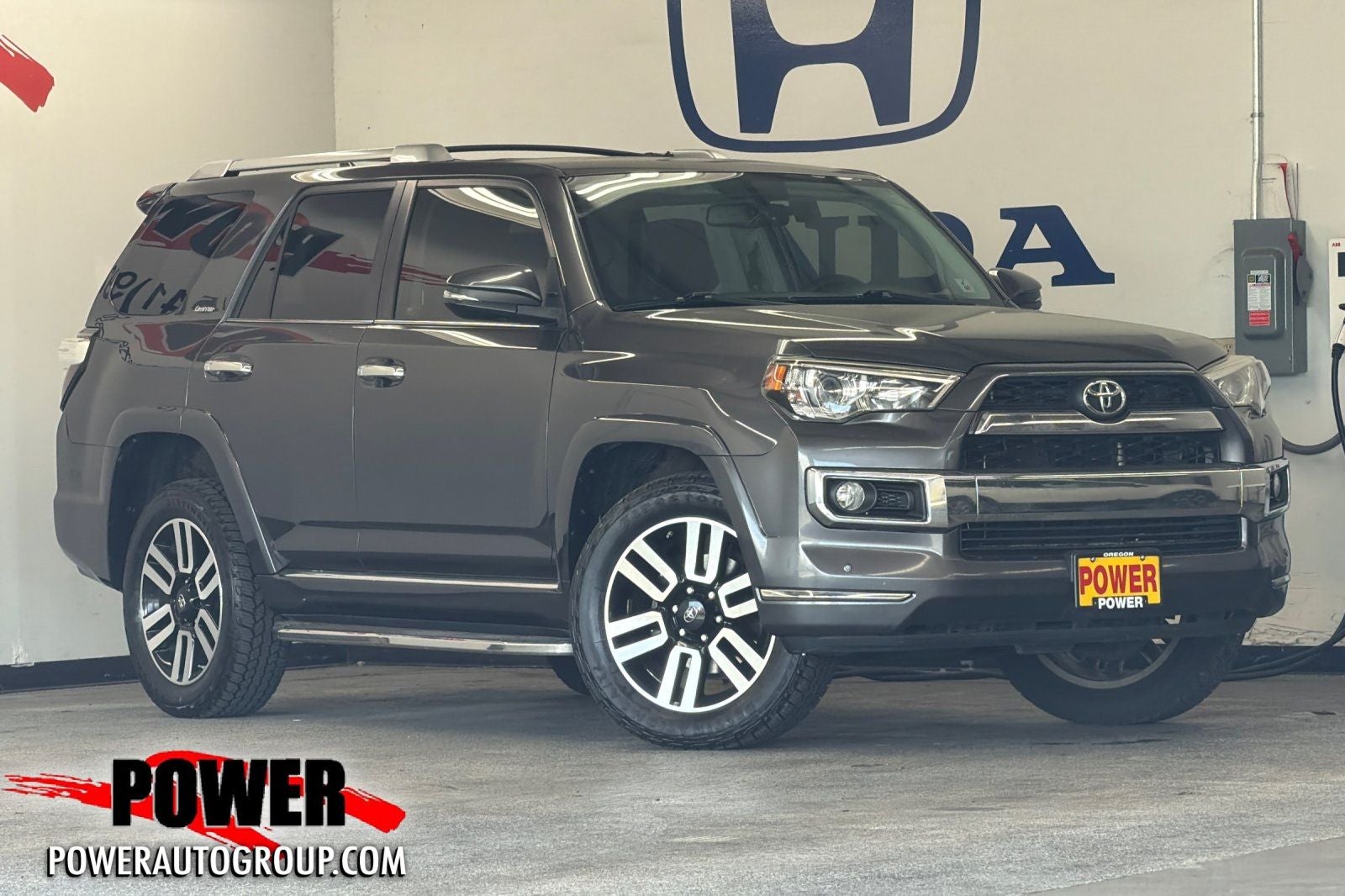 2016 Toyota 4Runner Limited in Magnetic Gray Metallic — front three-quarter view