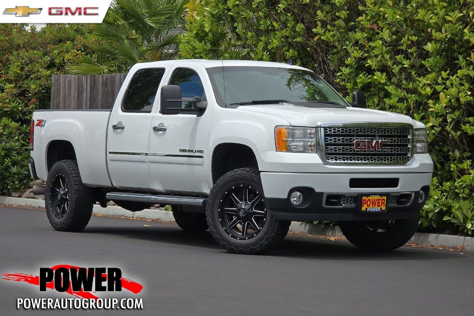 2012 GMC Sierra 2500HD Denali in Summit White — front three-quarter view