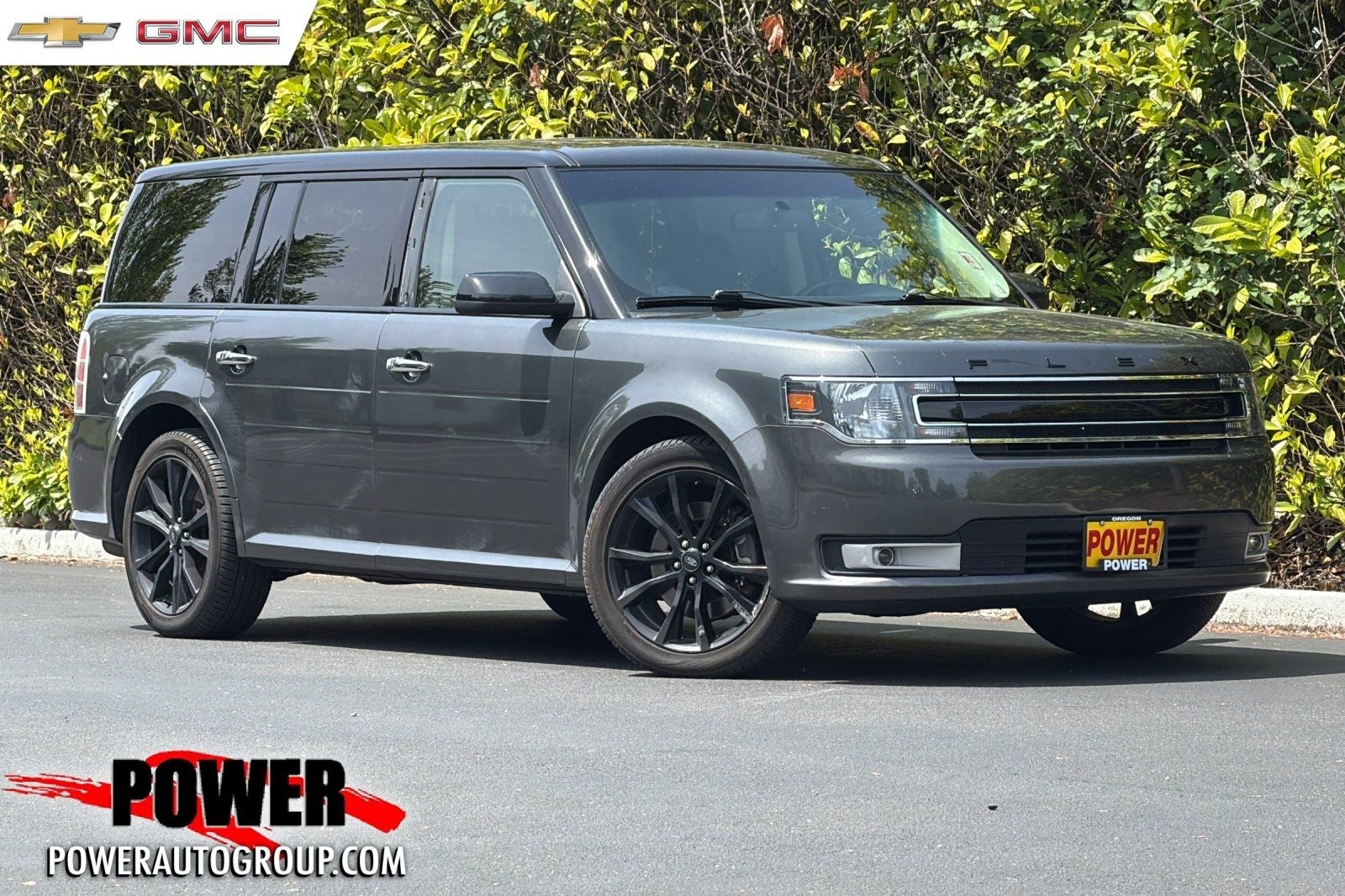 2019 Ford Flex SEL in Magnetic — front three-quarter view