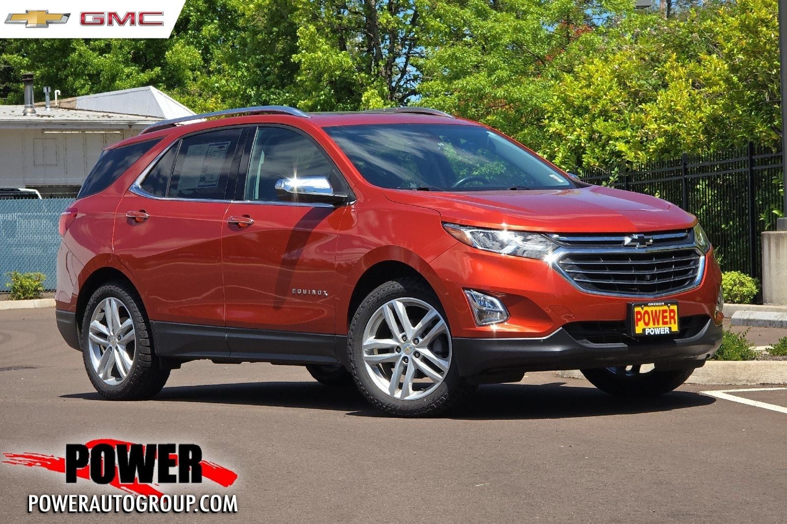 2020 Chevrolet Equinox Premier in Orange Metallic — front three-quarter view