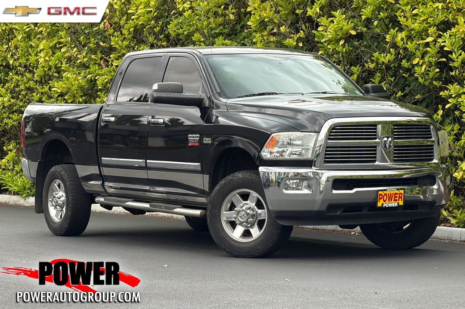 2010 RAM 2500 SLT in Brilliant Black Crystal Pearl — front three-quarter view