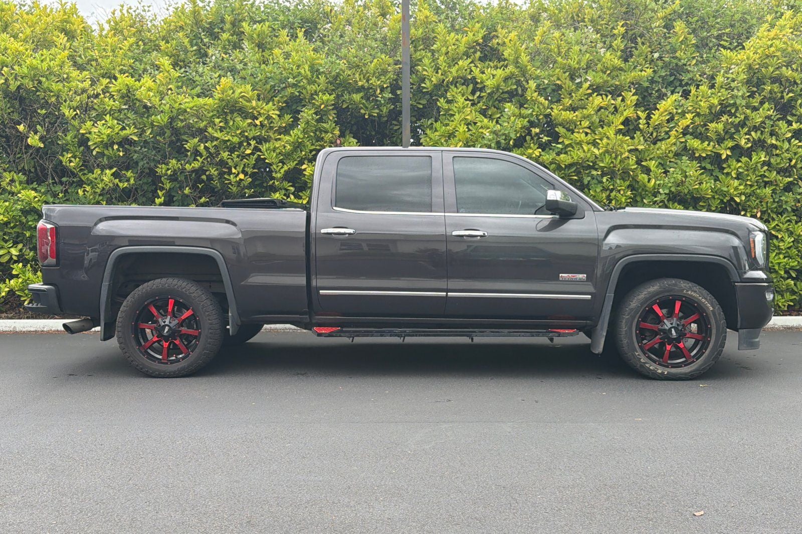 2016 GMC Sierra 1500 — rear three-quarter view