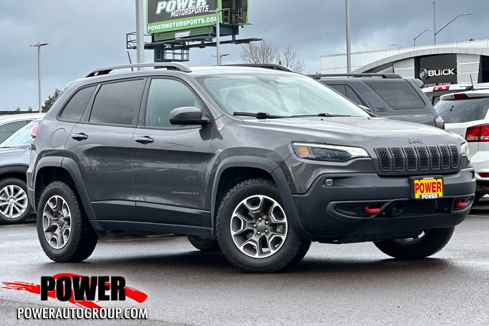 2020 Jeep Cherokee Trailhawk in Granite Crystal Metallic Clearcoat — front three-quarter view