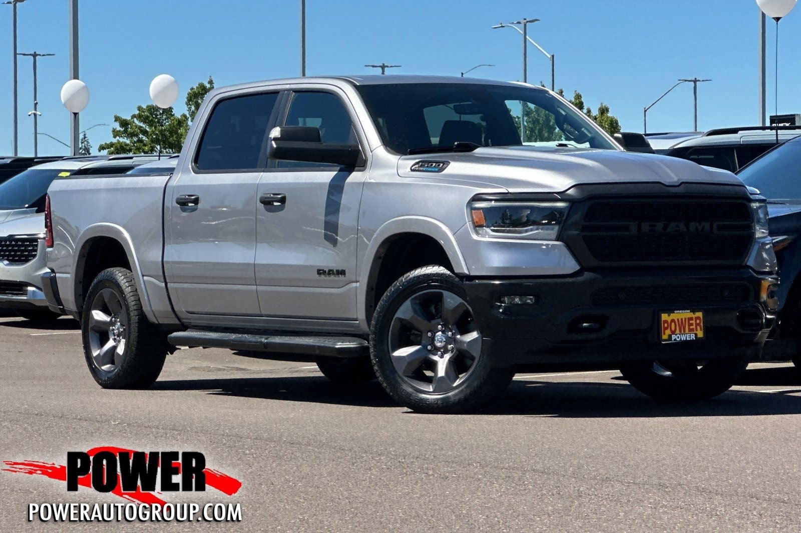2021 RAM 1500 Big Horn/Lone Star in Billet Silver Metallic Clearcoat — front three-quarter view