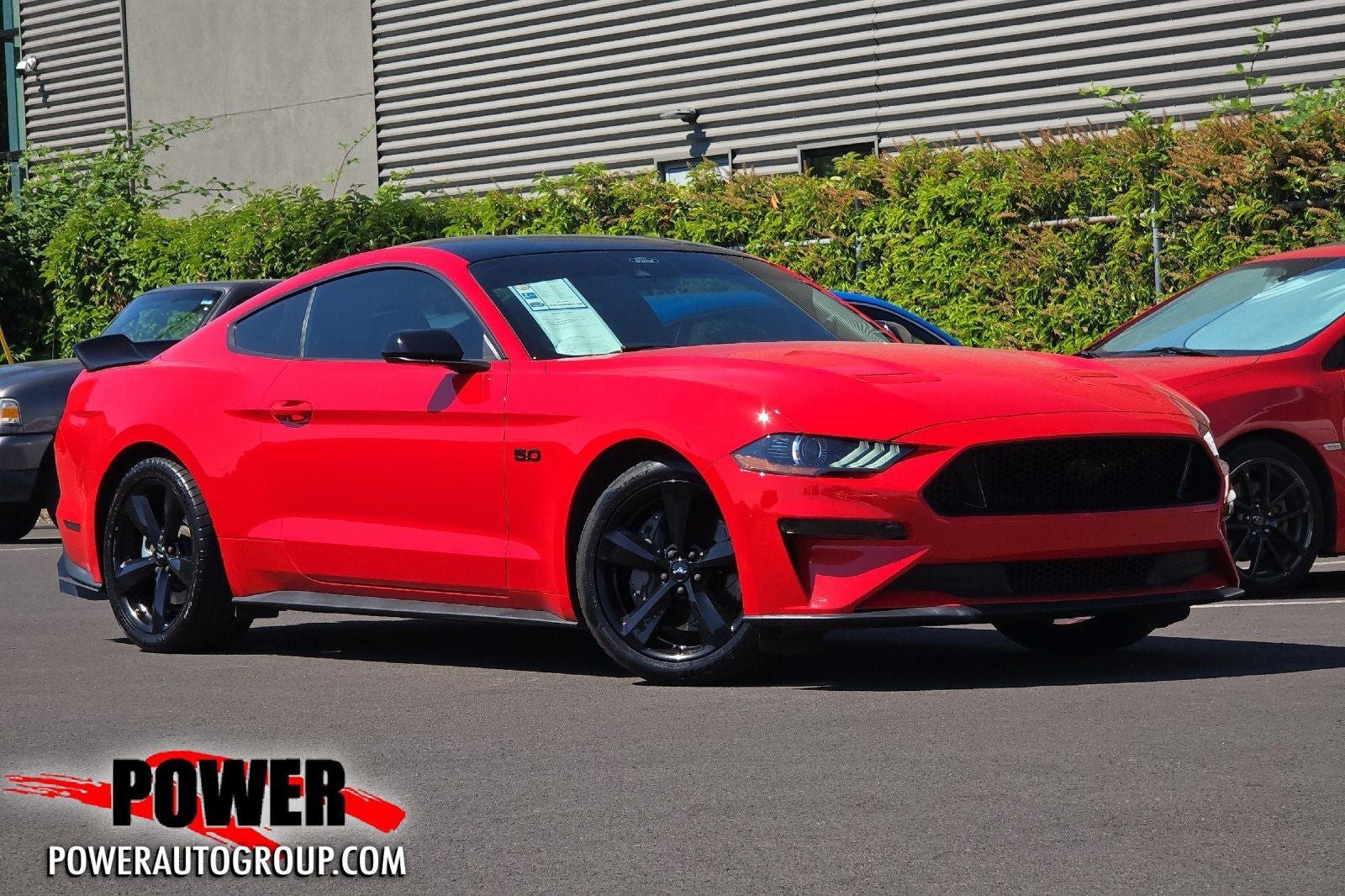 2023 Ford Mustang GT Premium in Race Red — front three-quarter view