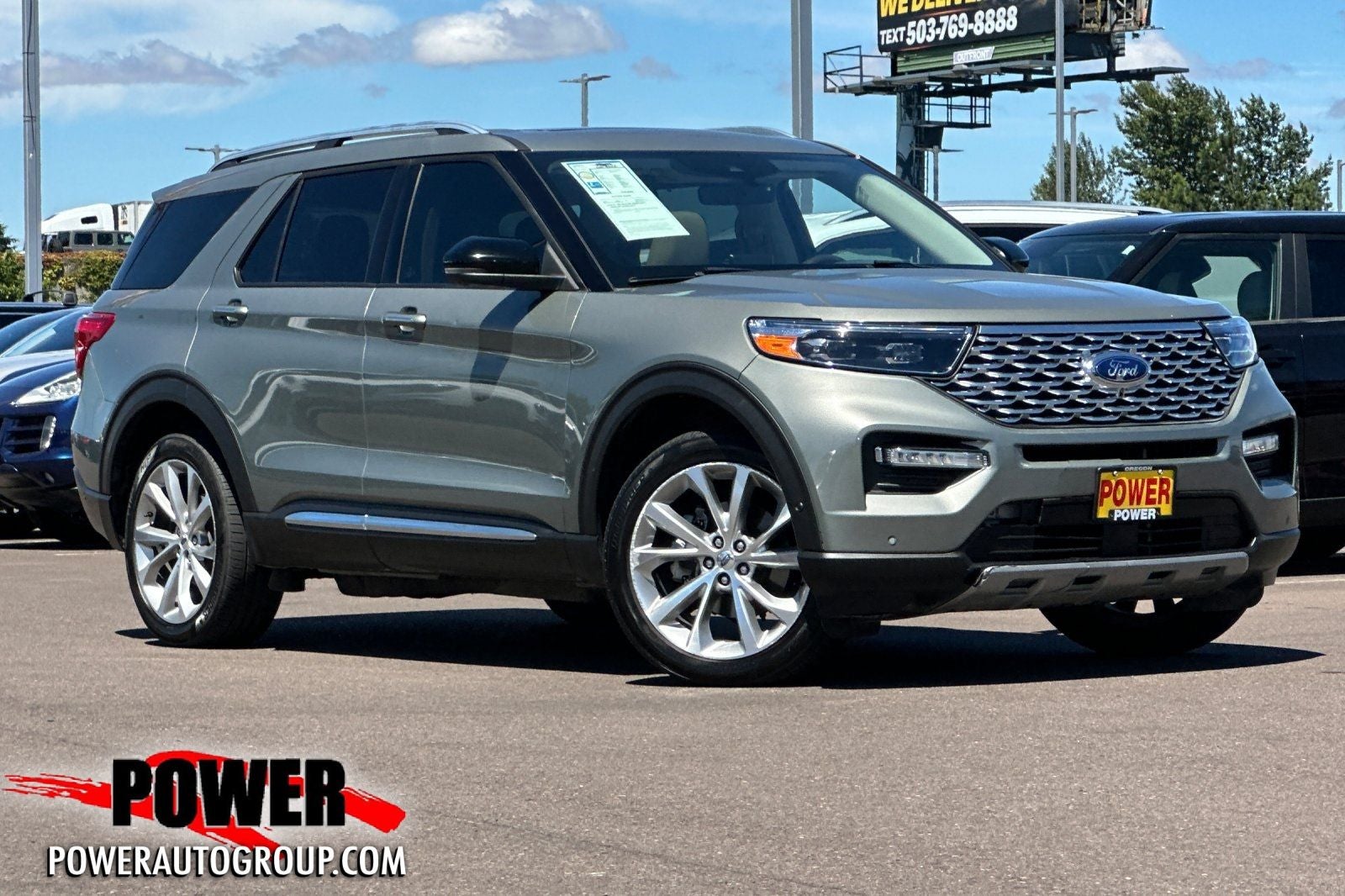 2020 Ford Explorer Platinum in Rich Copper Metallic Tinted Clearcoat — front three-quarter view