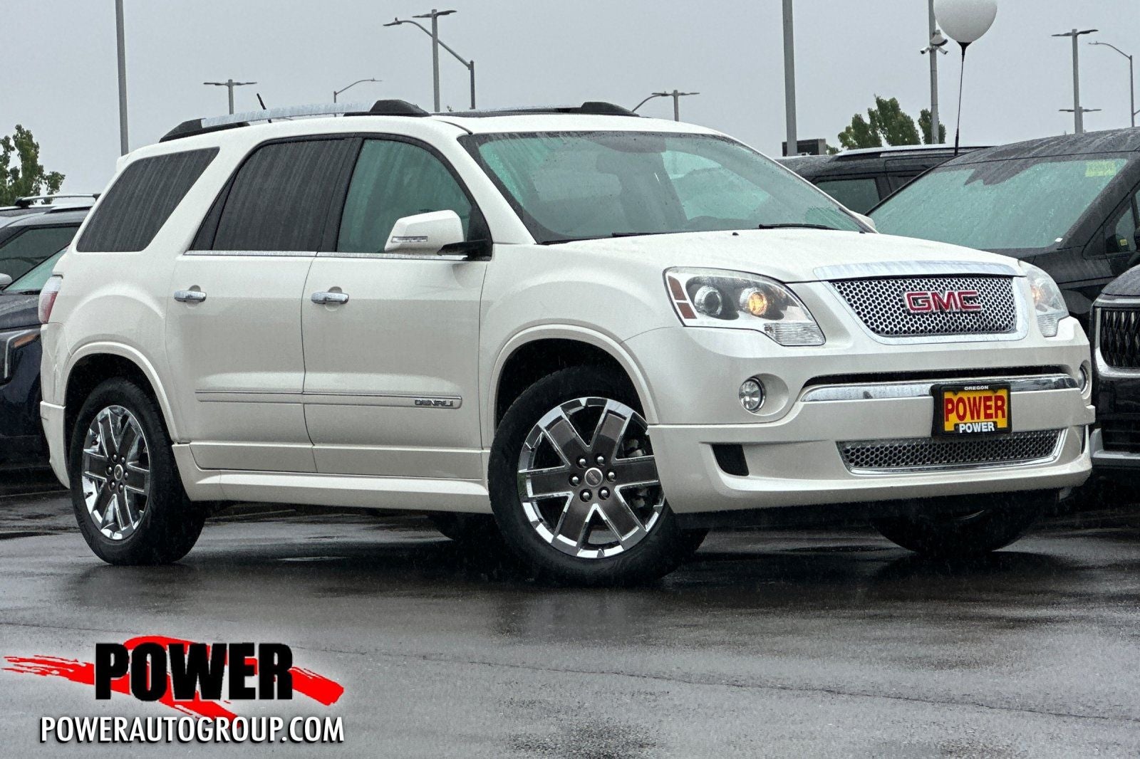2012 GMC Acadia Denali in White Diamond Clearcoat — front three-quarter view
