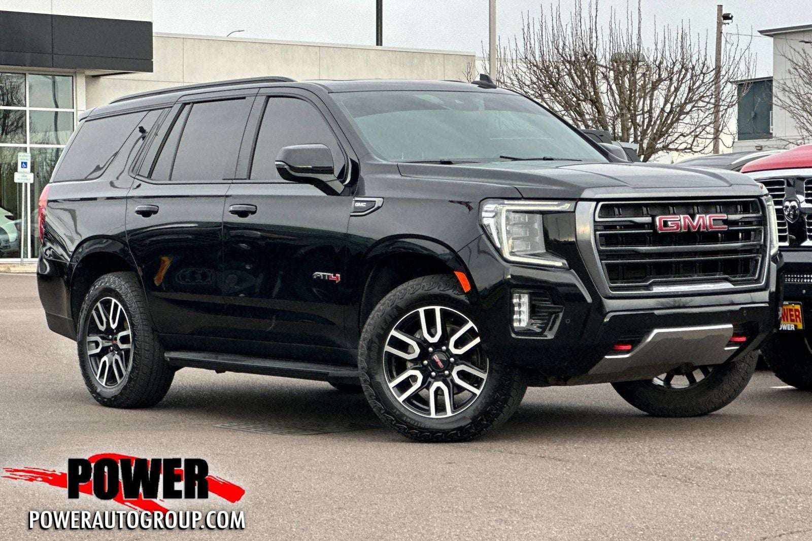 2024 GMC Yukon AT4 in Black — front three-quarter view