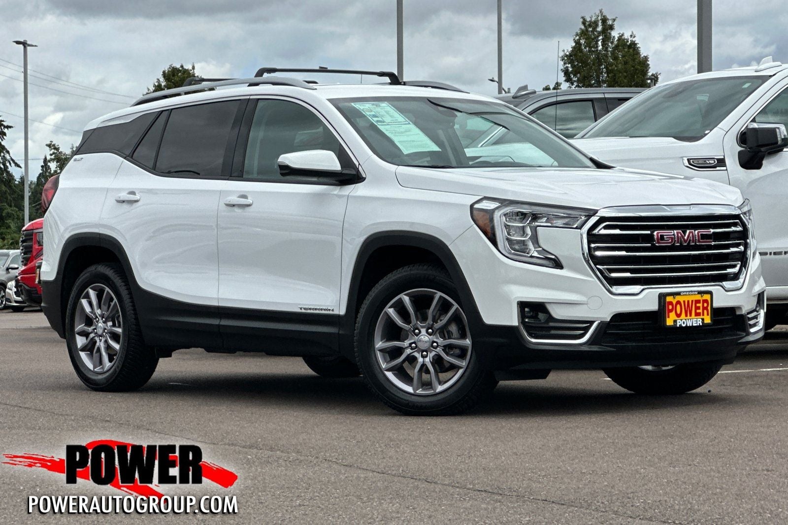 2023 GMC Terrain SLT in Summit White — front three-quarter view