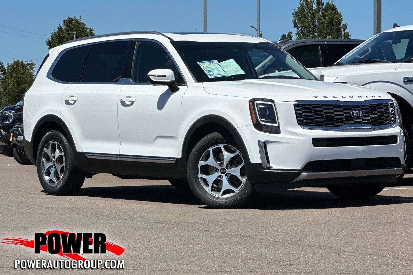 2020 Kia Telluride EX in Snow White Pearl — front three-quarter view