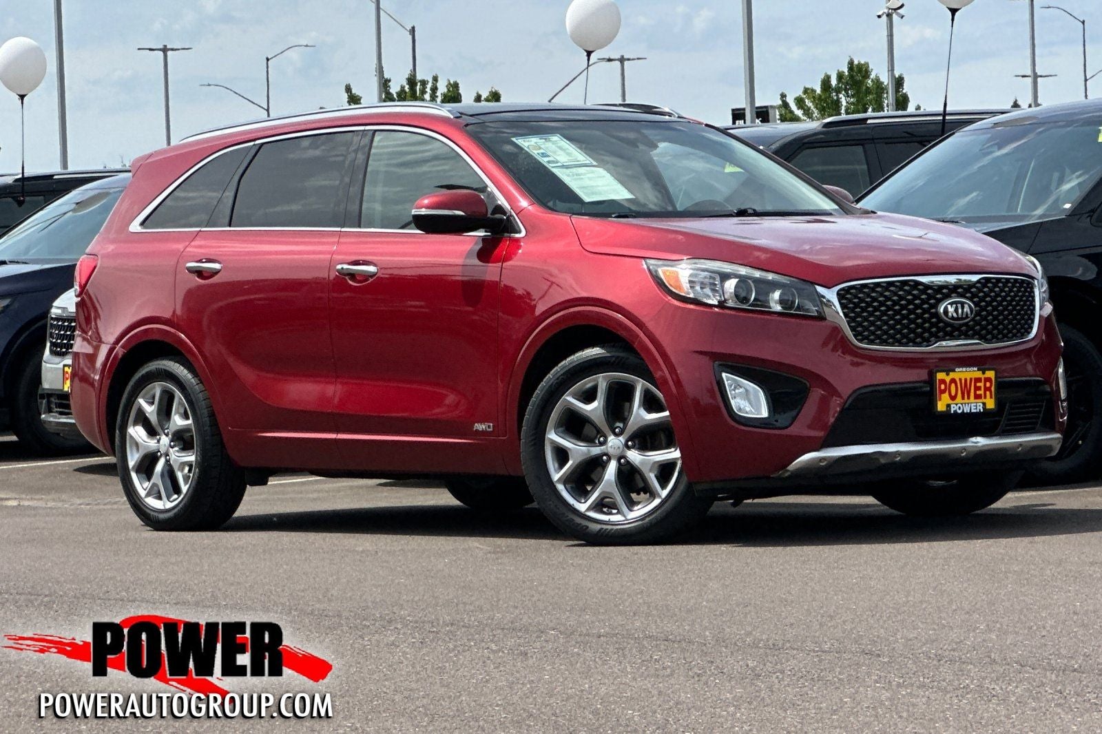 2017 Kia Sorento SX in Remington Red Metallic — front three-quarter view