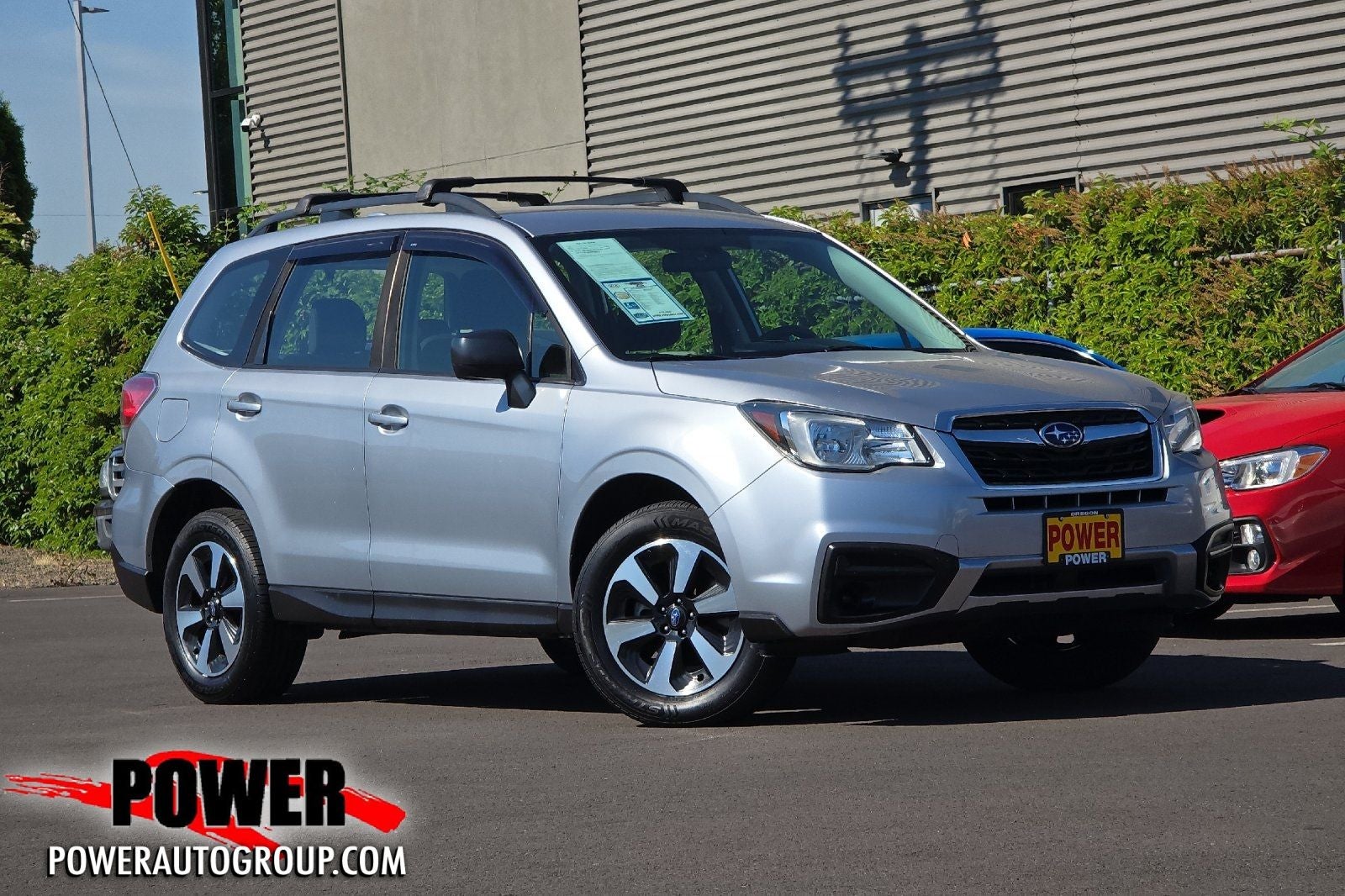 2018 Subaru Forester 2.5i in Ice Silver Metallic — front three-quarter view