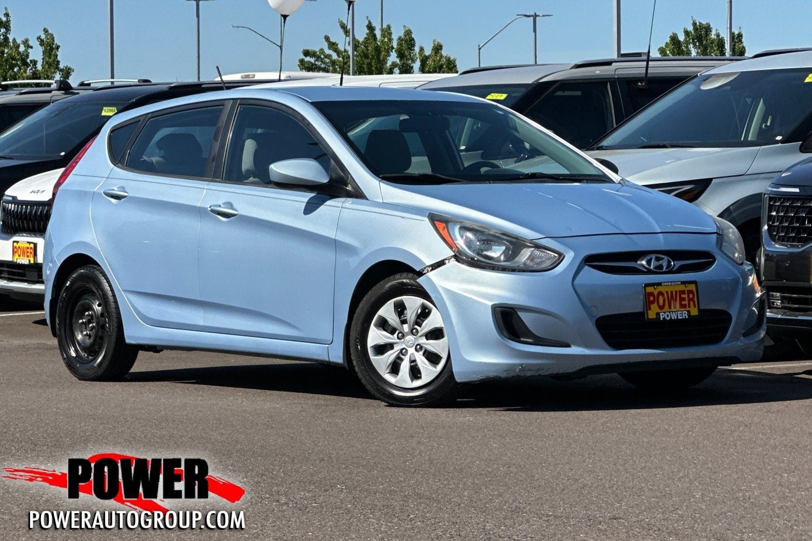 2012 Hyundai Accent GS in Clearwater Blue — front three-quarter view